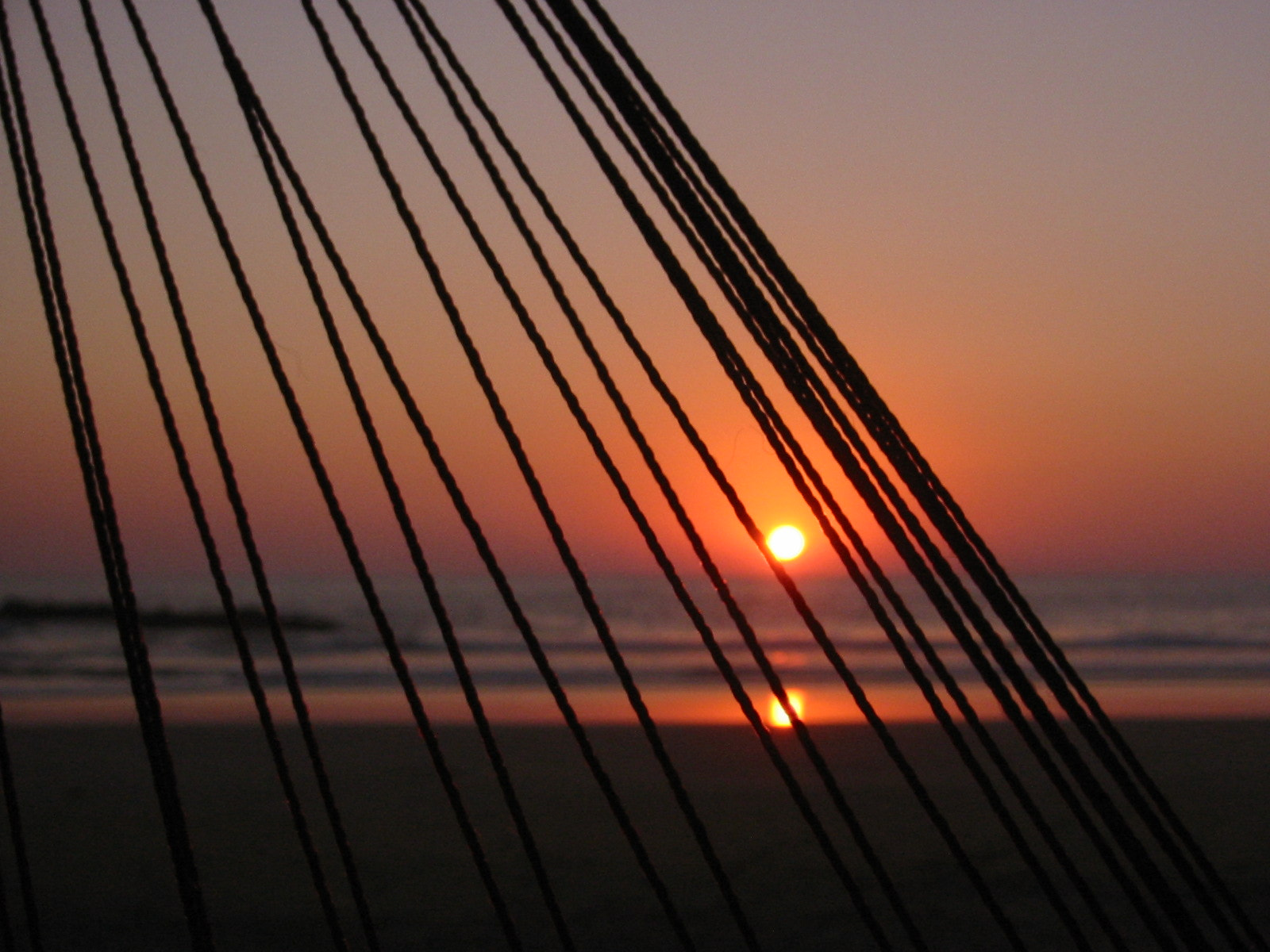 Canon DIGITAL IXUS V2 sample photo. Hammock and sunset photography