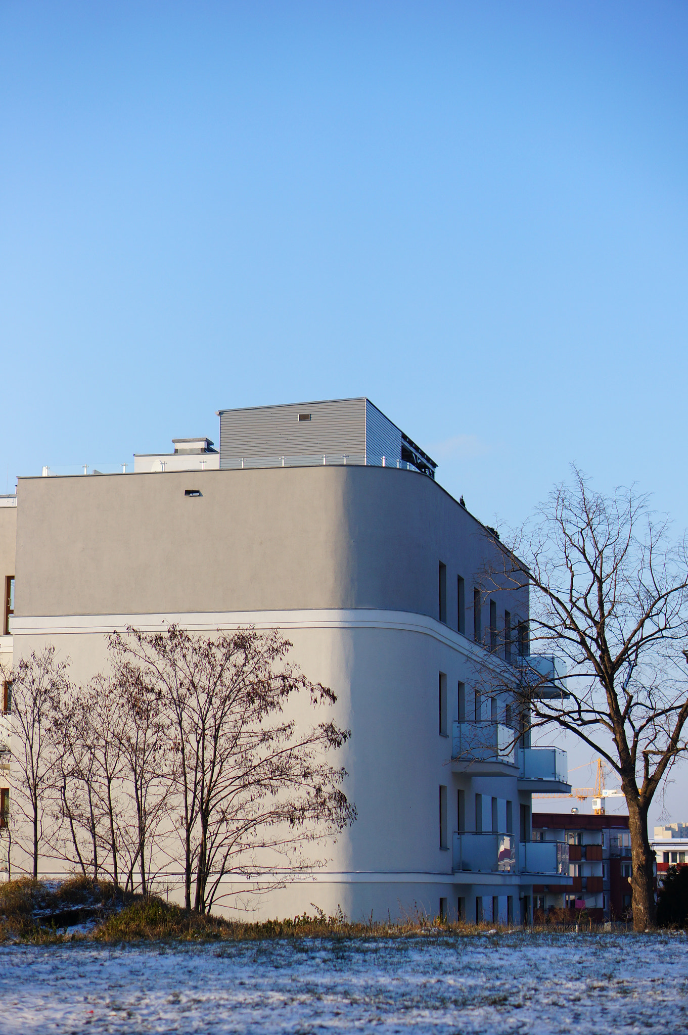 Sony Alpha NEX-5N + Sony E 50mm F1.8 OSS sample photo. Modern apartment building photography