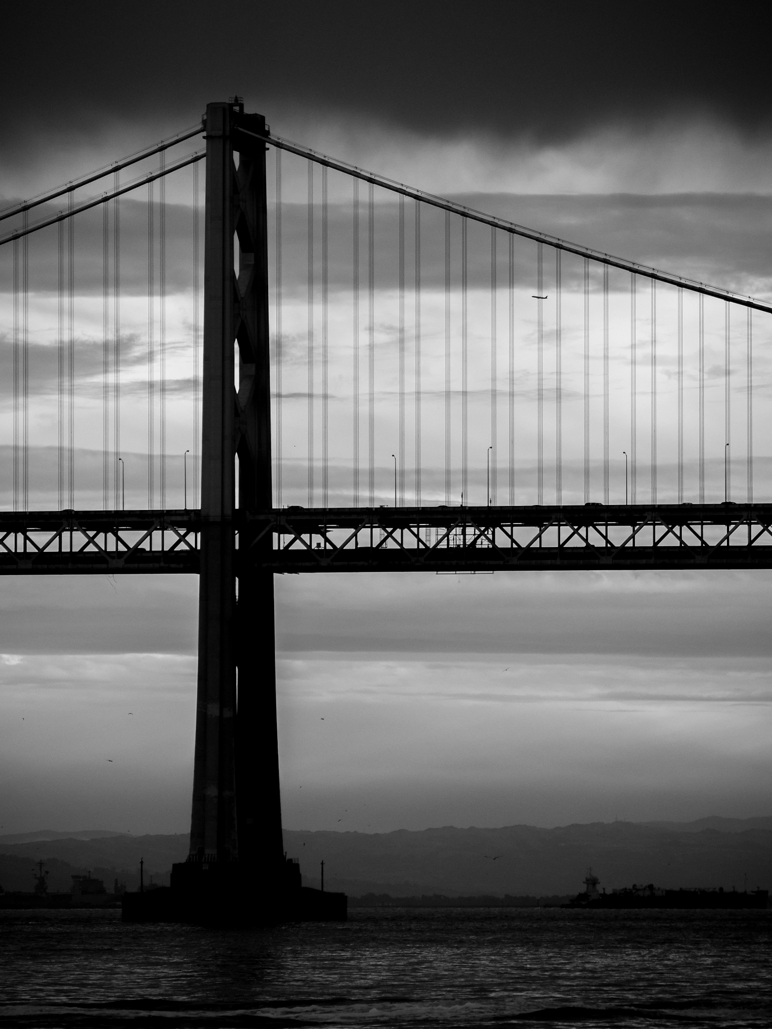 Panasonic Lumix G Vario 45-200mm F4-5.6 OIS sample photo. Bay bridge sillhouette photography