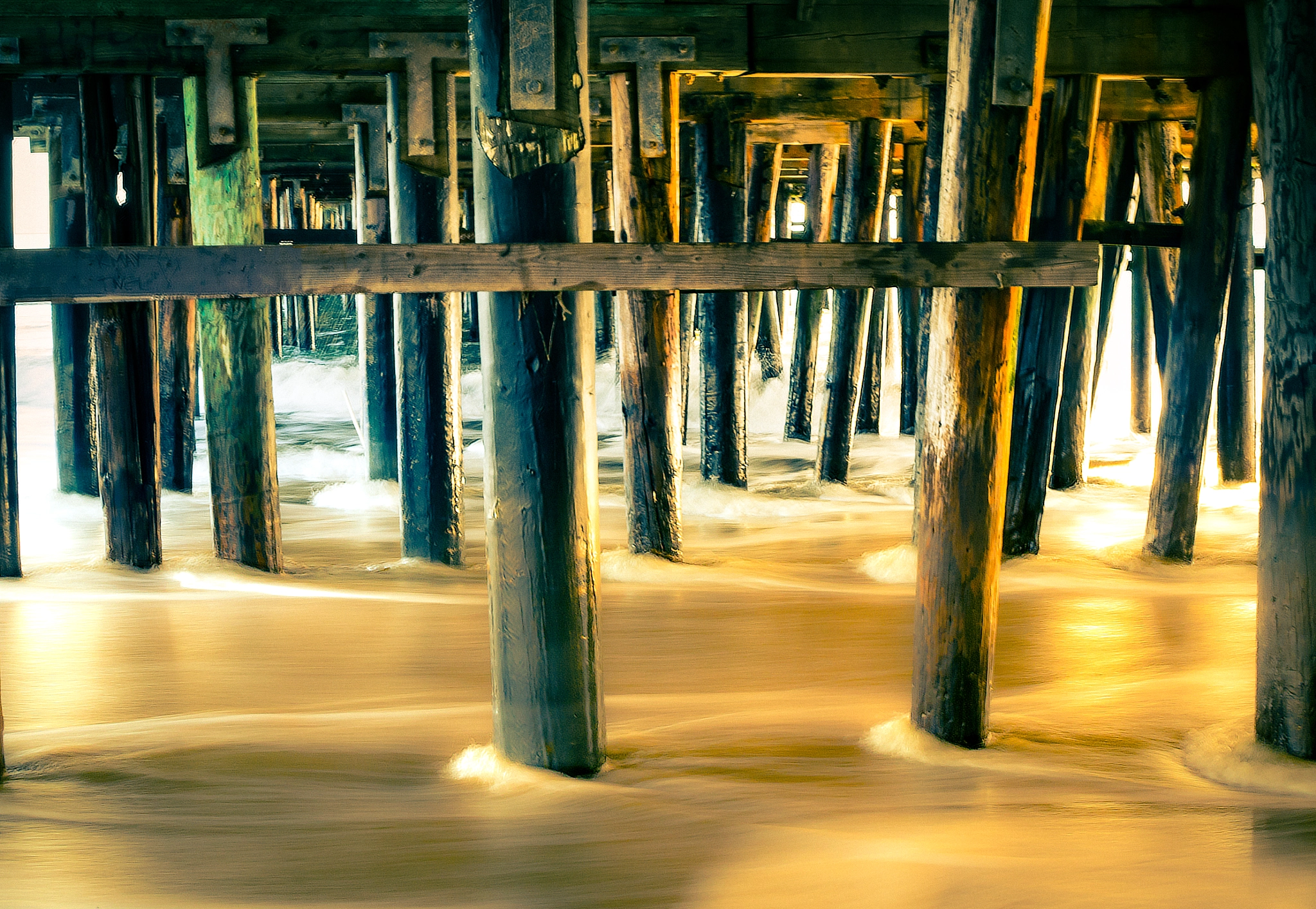 Panasonic Lumix DMC-GX7 + Olympus M.Zuiko Digital 25mm F1.8 sample photo. Glowing pier photography