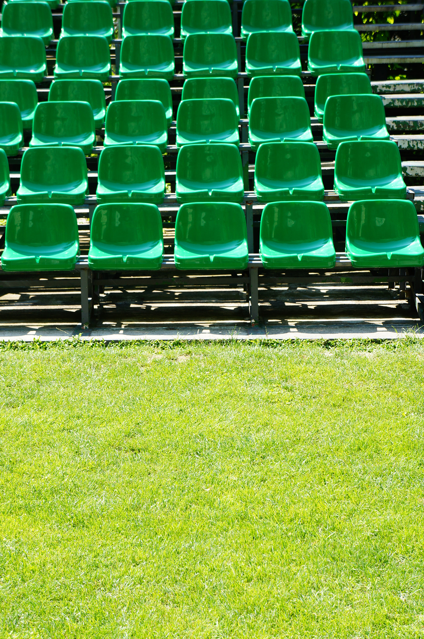 Sony E 18-55mm F3.5-5.6 OSS sample photo. Green seats photography