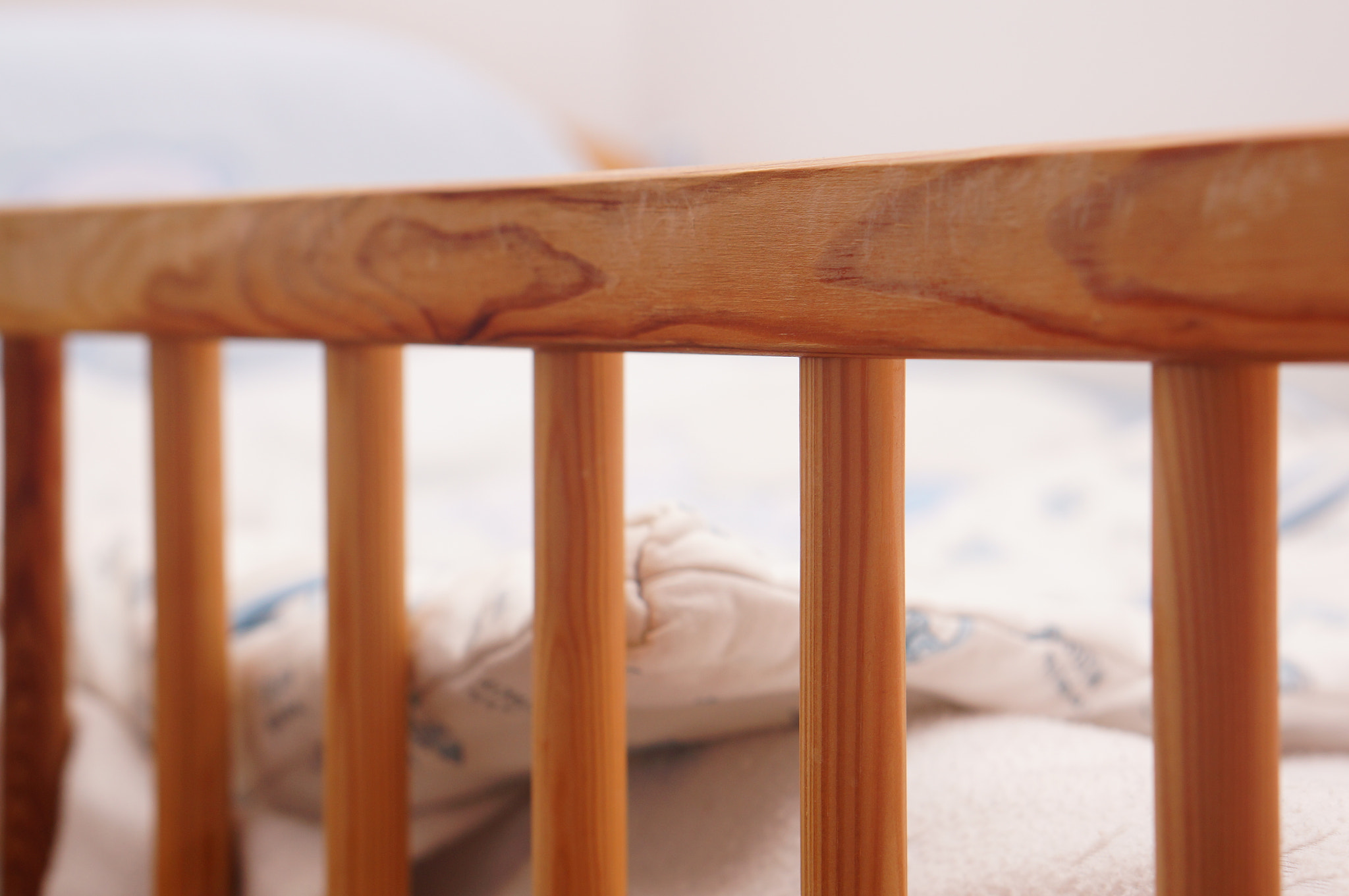 Sony Alpha NEX-6 + Sony E 50mm F1.8 OSS sample photo. Wooden baby bed photography