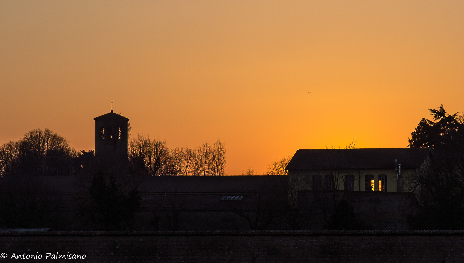 Sigma 17-70mm F2.8-4 DC Macro OS HSM | C sample photo. Campanile al tramonto photography