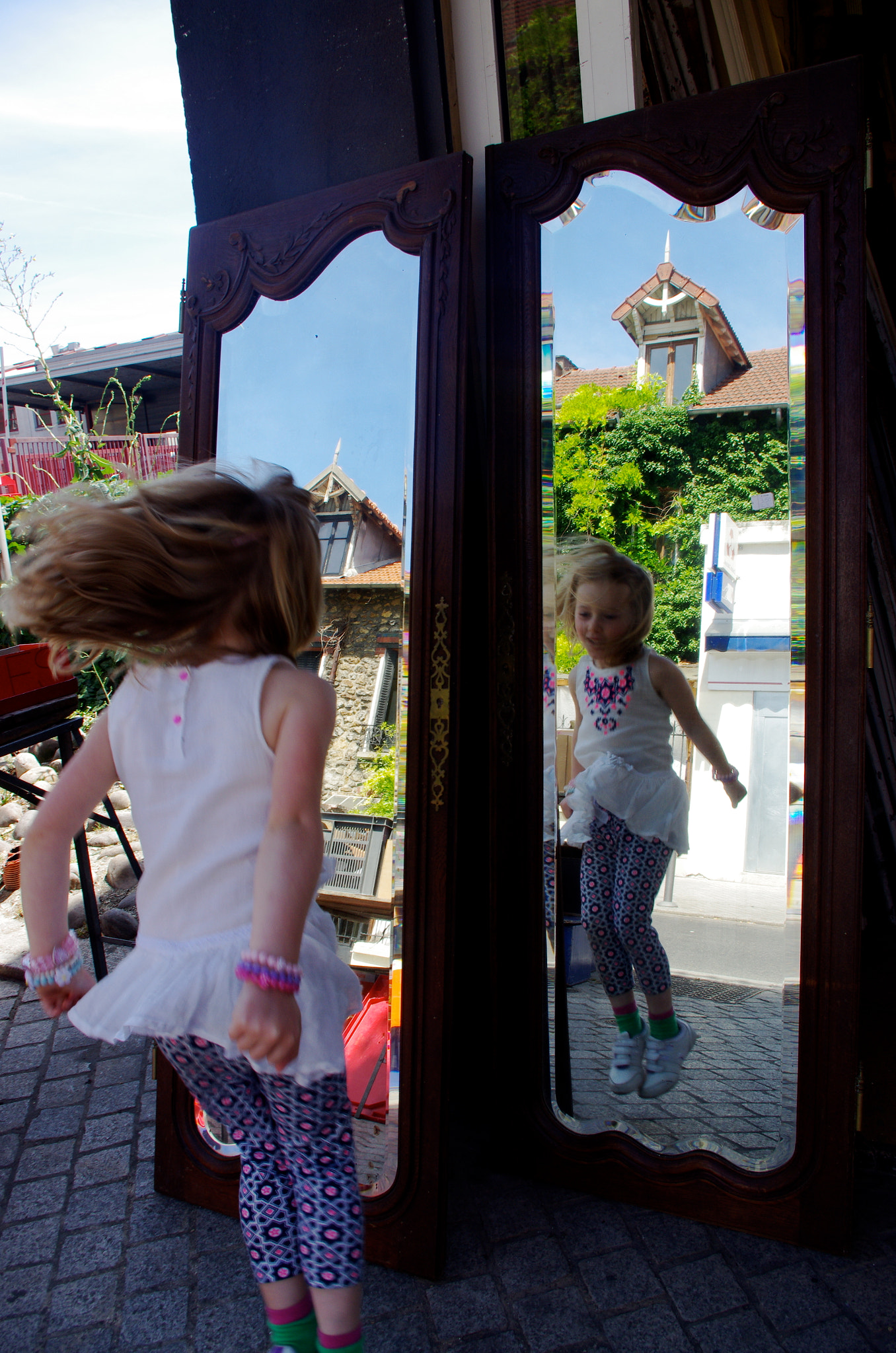 Pentax K-5 sample photo. Jumping girl reflection photography