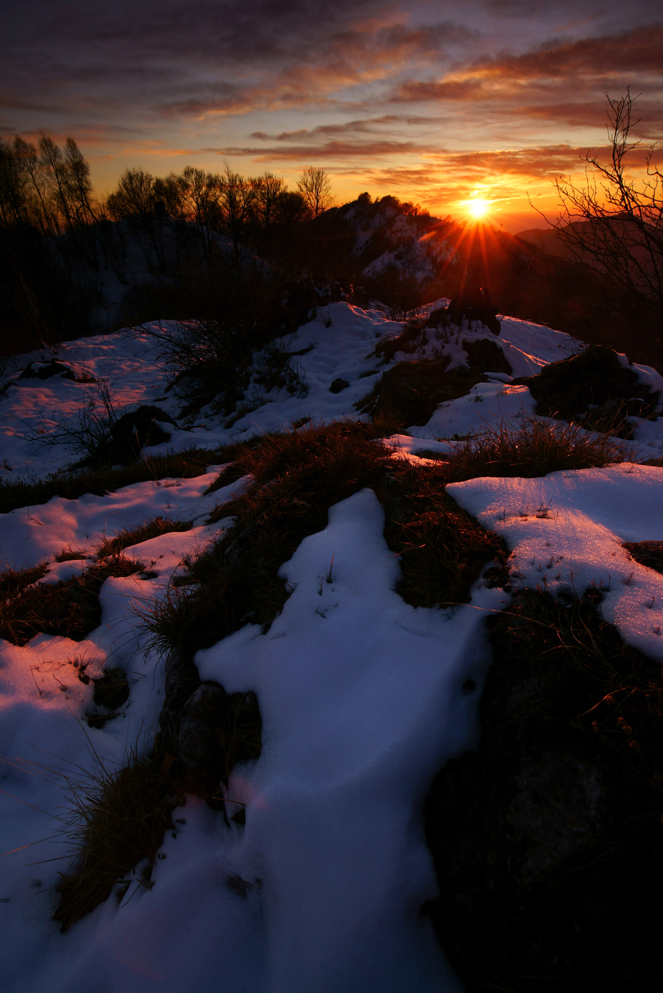16-35mm F4 OSS sample photo. Sun painting the snow photography
