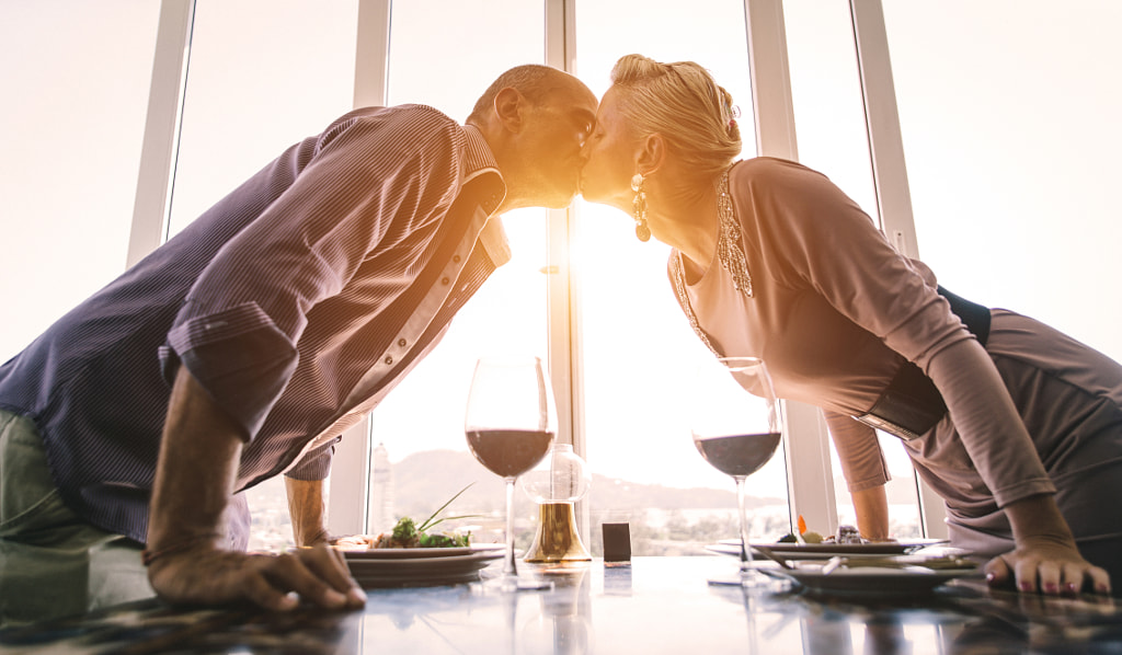 Middle age couple at the restaurant by Cristian Negroni on 500px.com