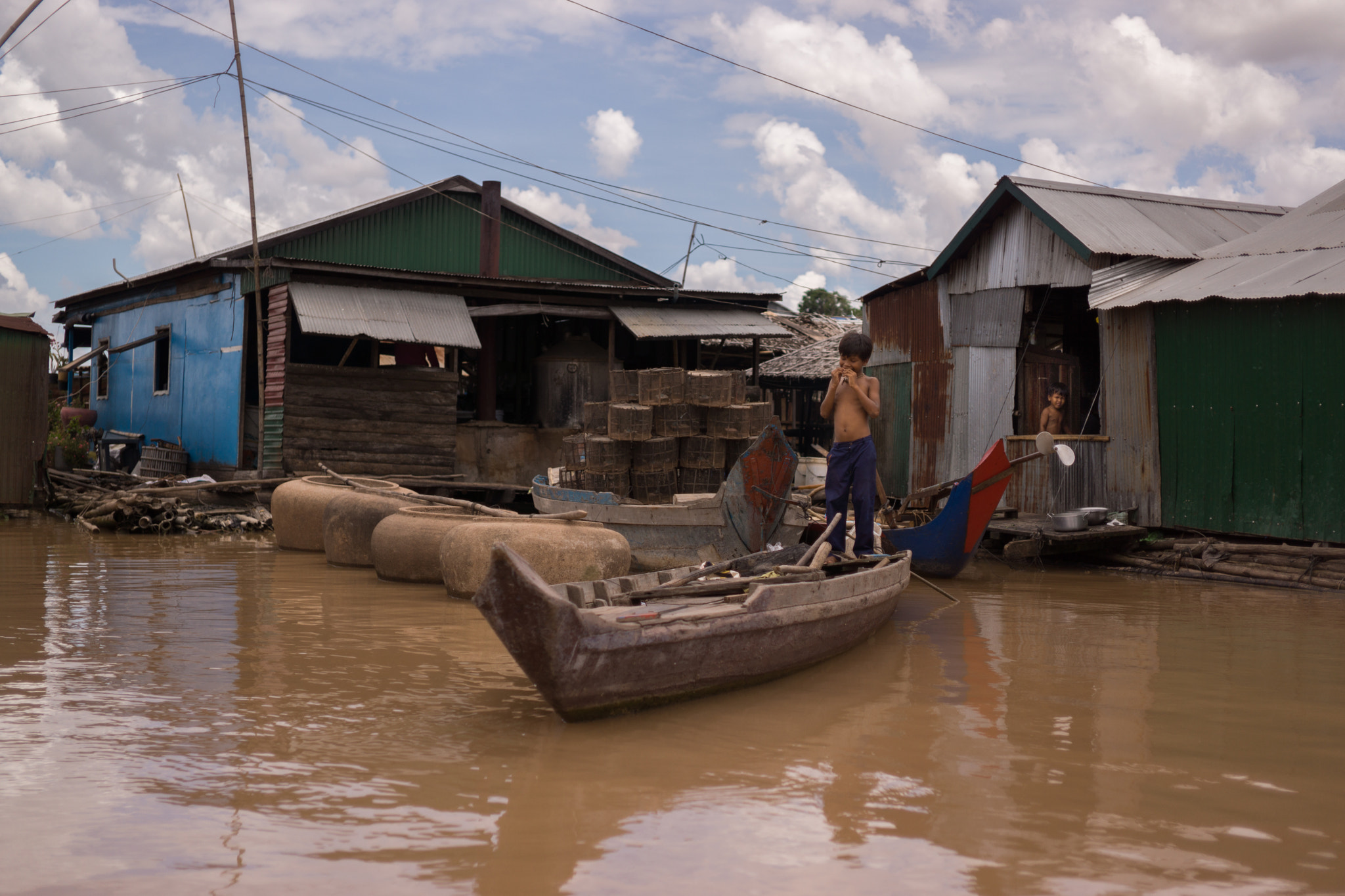 Sony Alpha NEX-7 + E 32mm F1.8 sample photo. Ciudad flotante de phoum kandal iv photography