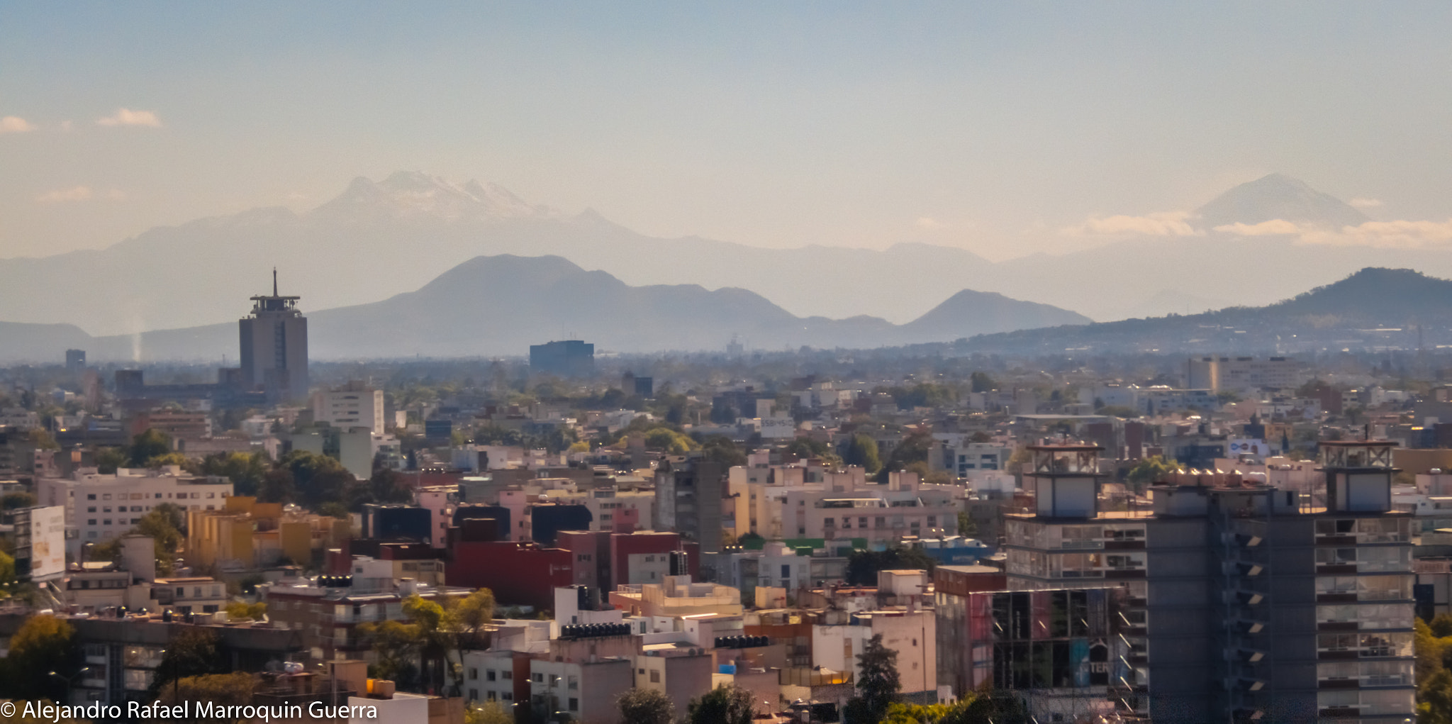 Fujifilm FinePix E550 sample photo. City and volcanos photography