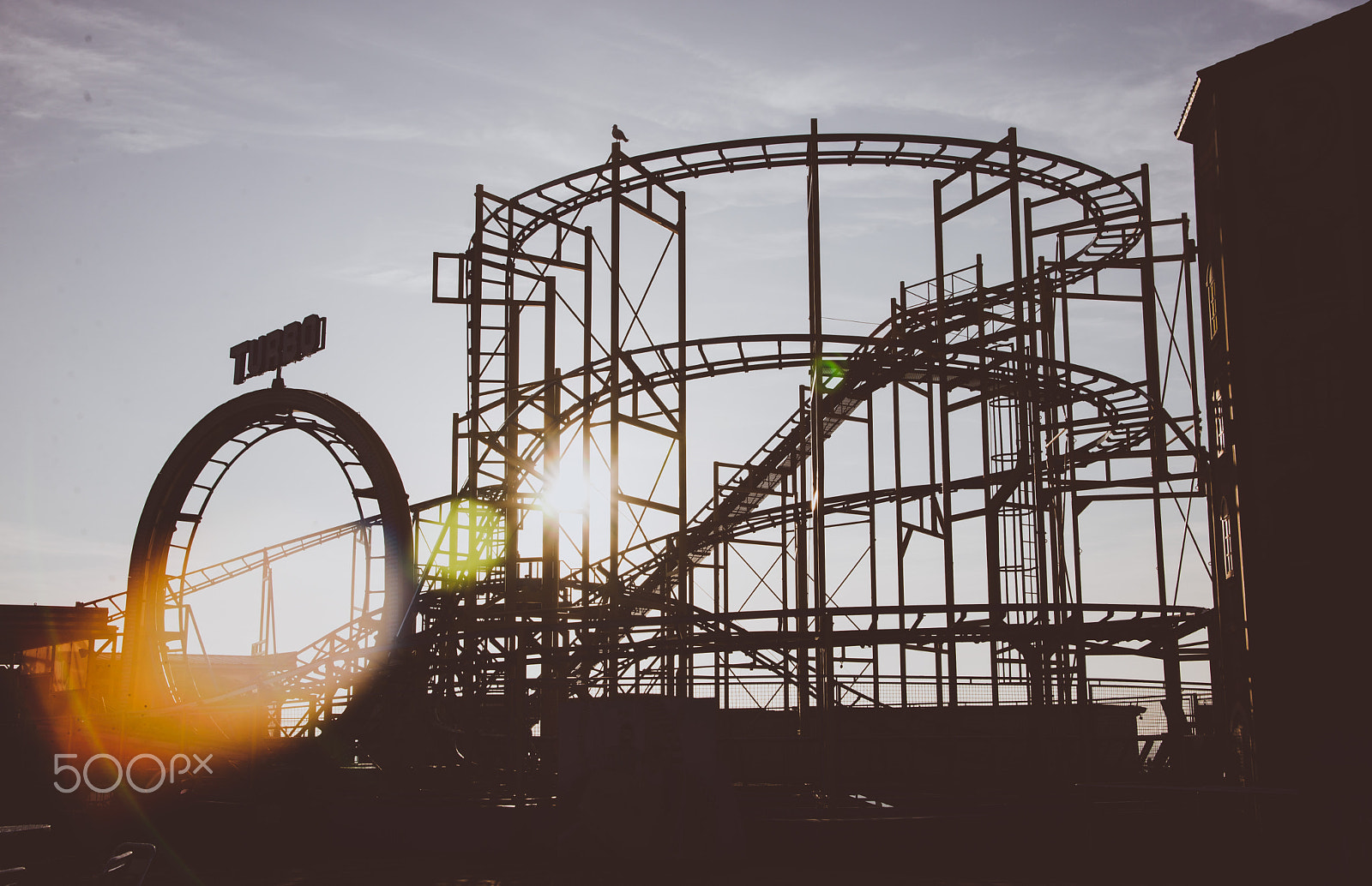 Nikon D610 + Tamron AF 28-300mm F3.5-6.3 XR Di VC LD Aspherical (IF) Macro sample photo. Brighton rollercoaster in silhouette photography