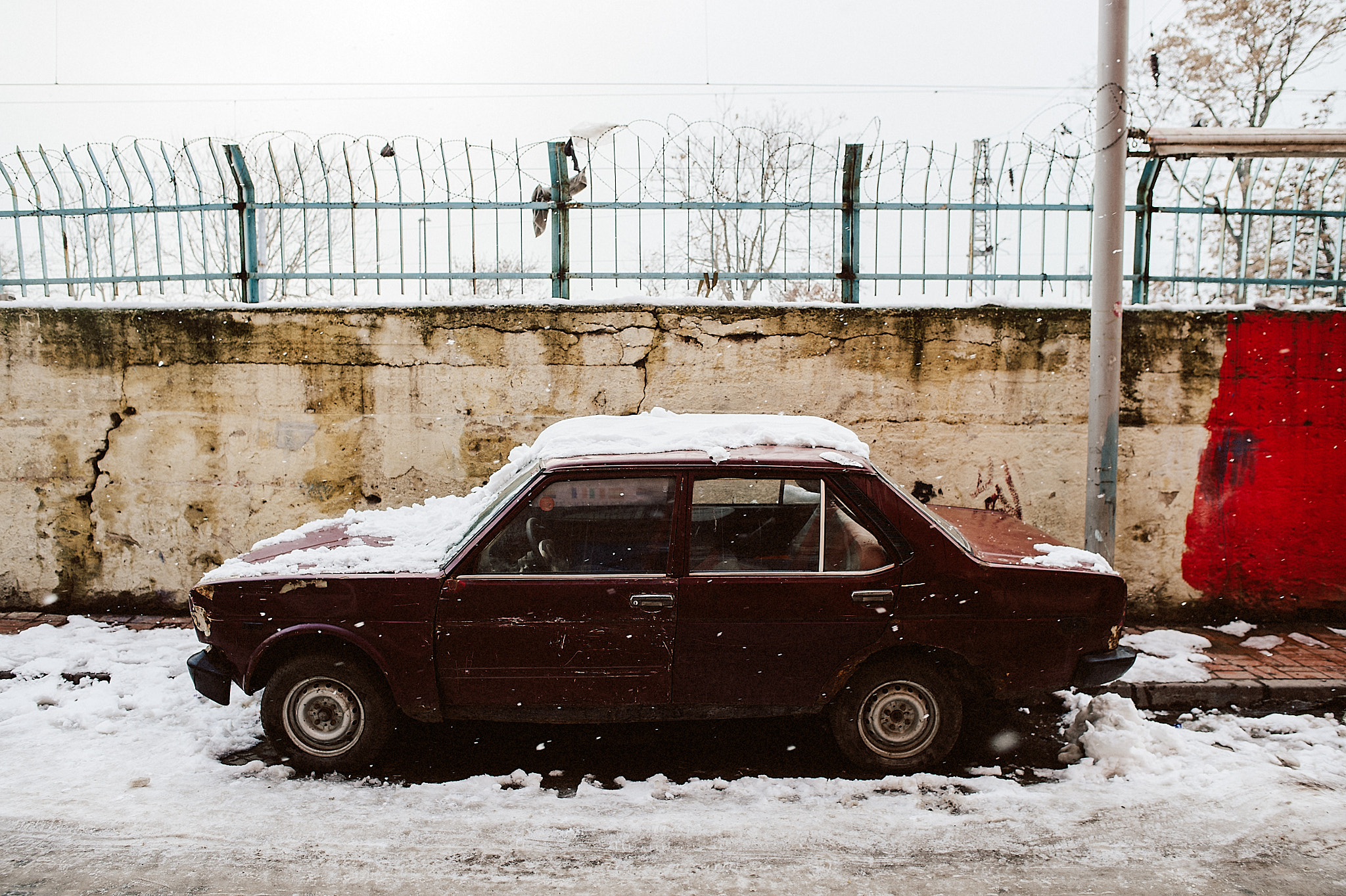 Nikon D4S + Nikon AF-S Nikkor 24mm F1.8G ED sample photo. Snow car photography