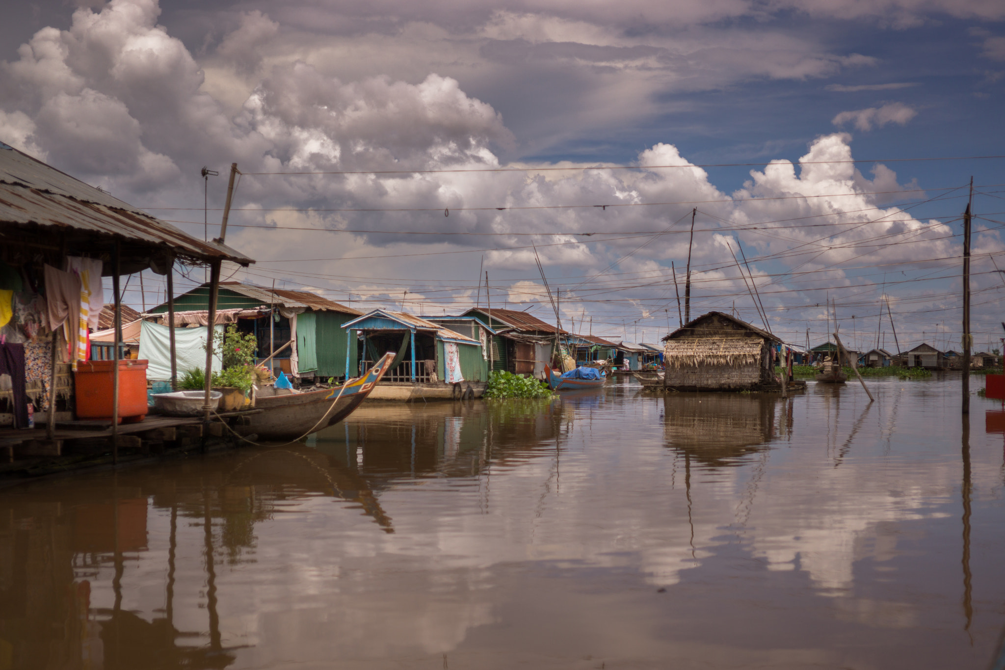 Sony Alpha NEX-7 + E 32mm F1.8 sample photo. Ciudad flotante de phoum kandal photography