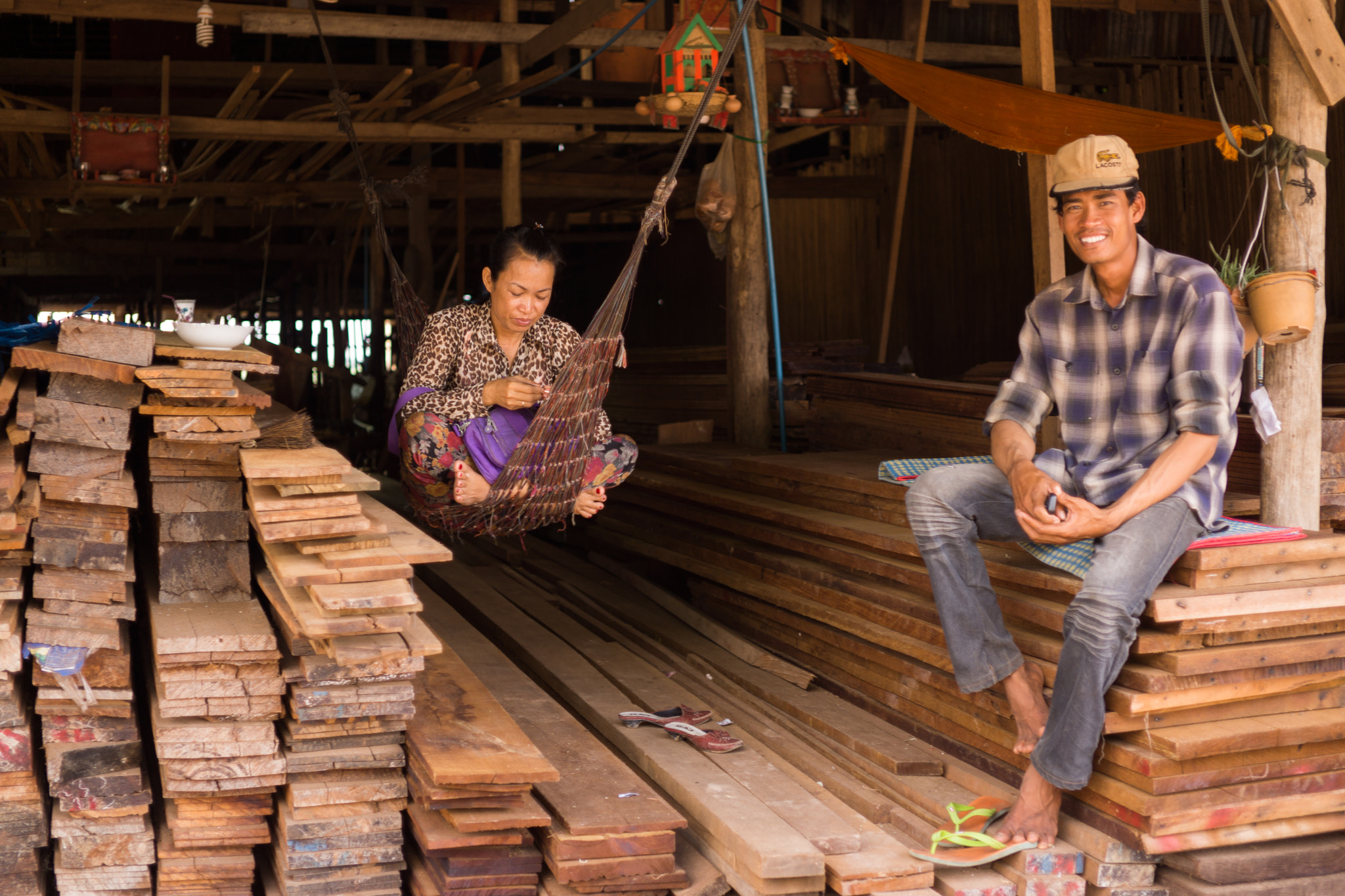 E 32mm F1.8 sample photo. Wood sellers photography