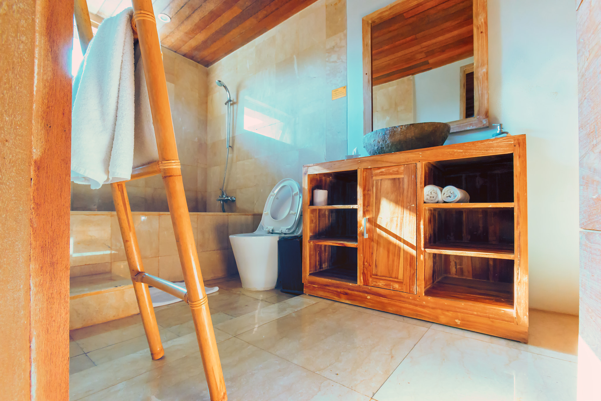 Sony a7 II + Canon EF 16-35mm F2.8L USM sample photo. Cozy balinese bathroom photography