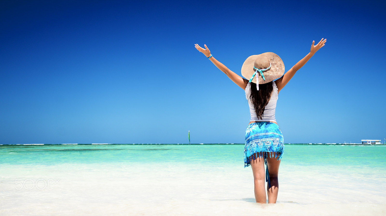 AF Zoom-Nikkor 35-80mm f/4-5.6D N sample photo. Woman relaxing at the tropical beach with arms open enjoying her photography