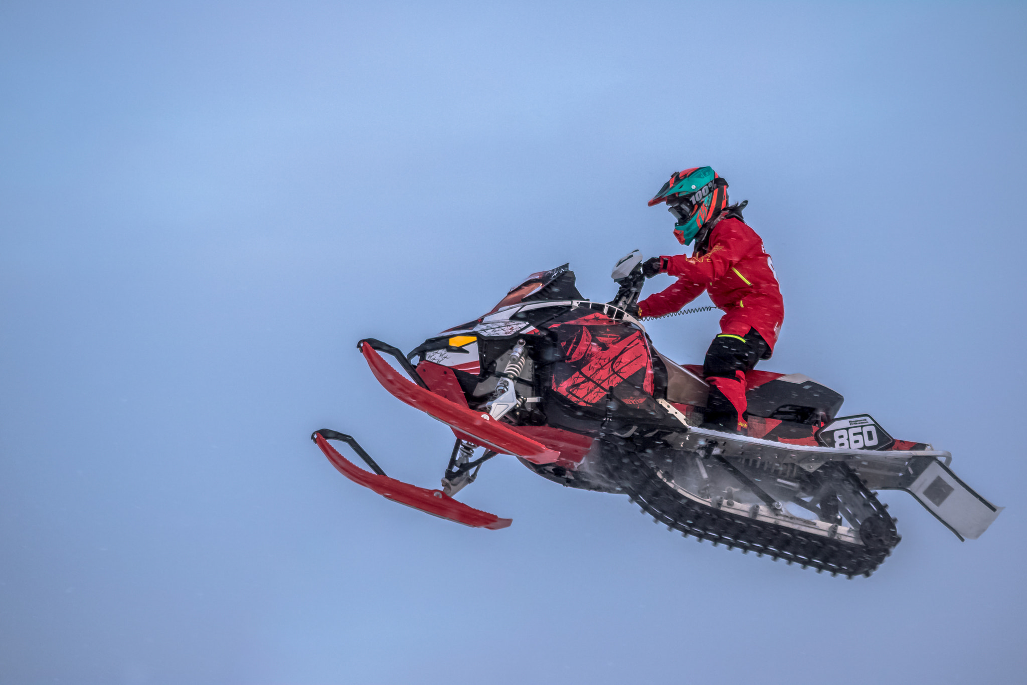 Canon EOS 750D (EOS Rebel T6i / EOS Kiss X8i) + Canon EF 55-200mm F4.5-5.6 II USM sample photo. Snowmobile during a jump photography