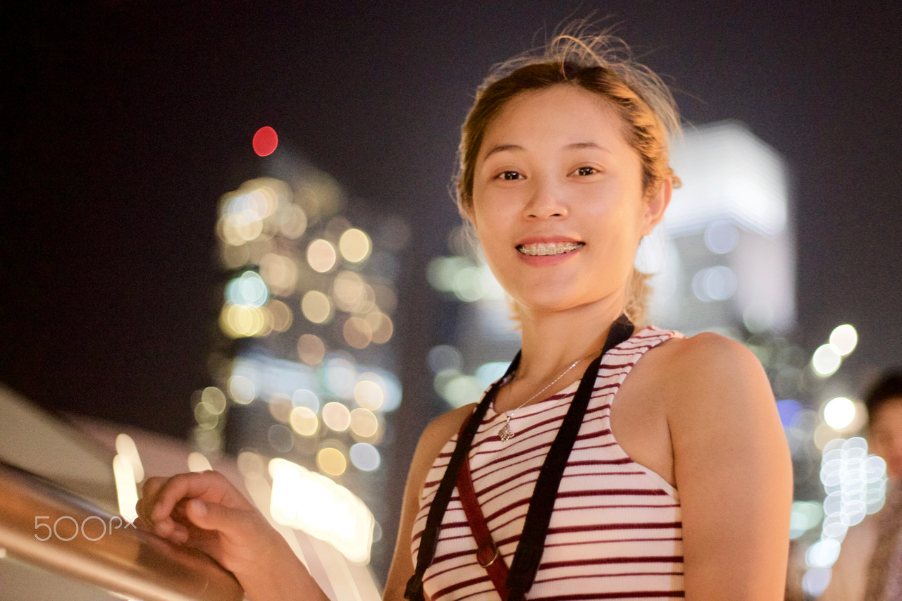 Canon EOS-1D X + Canon EF 50mm F1.8 II sample photo. Cute smile in singapore photography