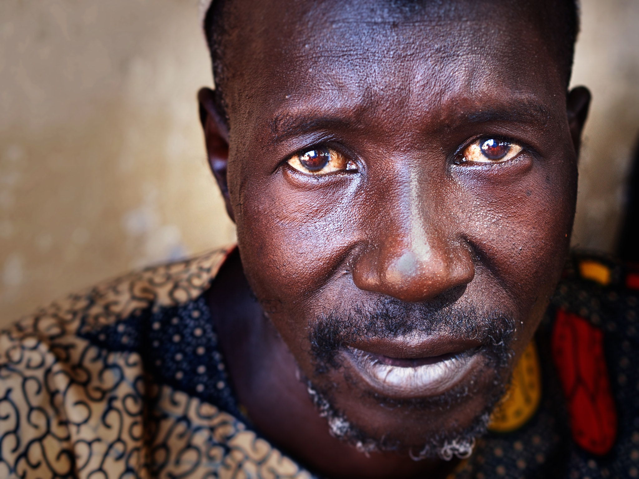 Olympus PEN E-PL5 + Olympus M.Zuiko Digital 45mm F1.8 sample photo. Gambian villager photography