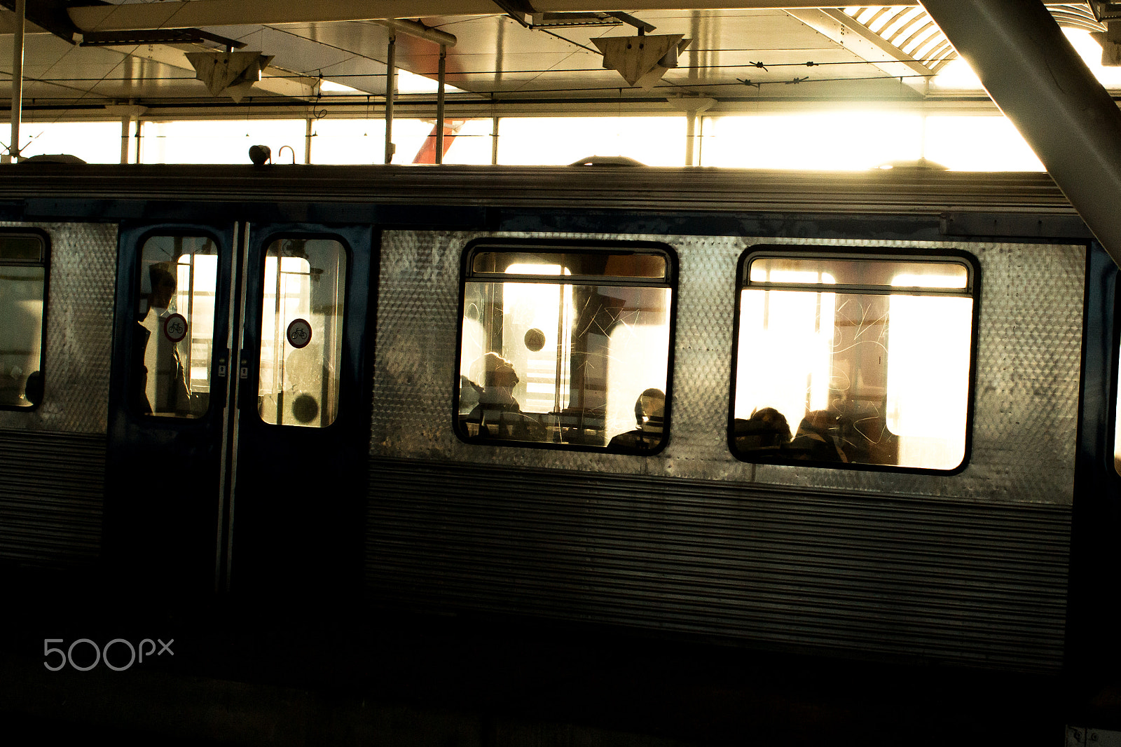 Sony 28mm F2.8 sample photo. Subway train hit by the sun photography