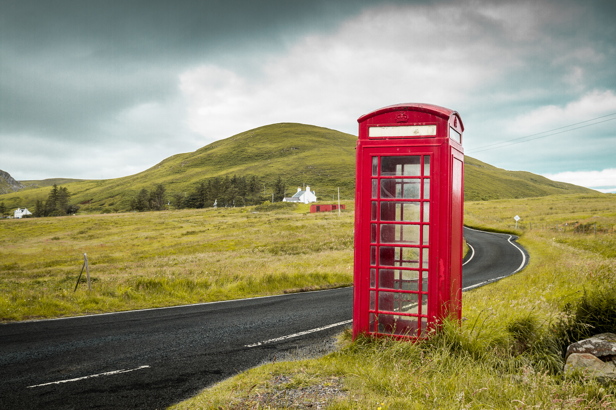 Red phone box in landscape