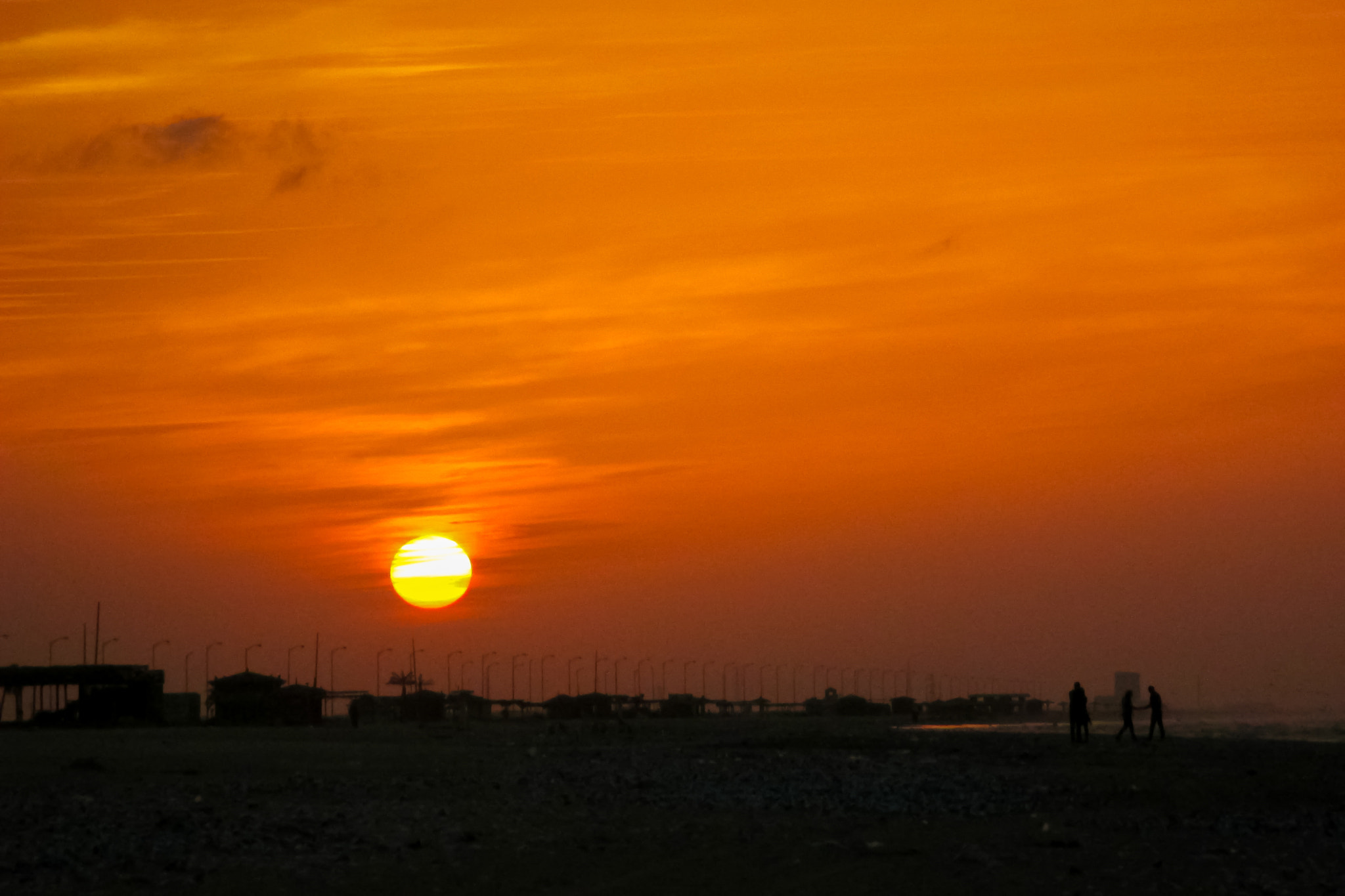 Canon PowerShot ELPH 130 IS (IXUS 140 / IXY 110F) sample photo. Amazing winter time sunset at beach photography
