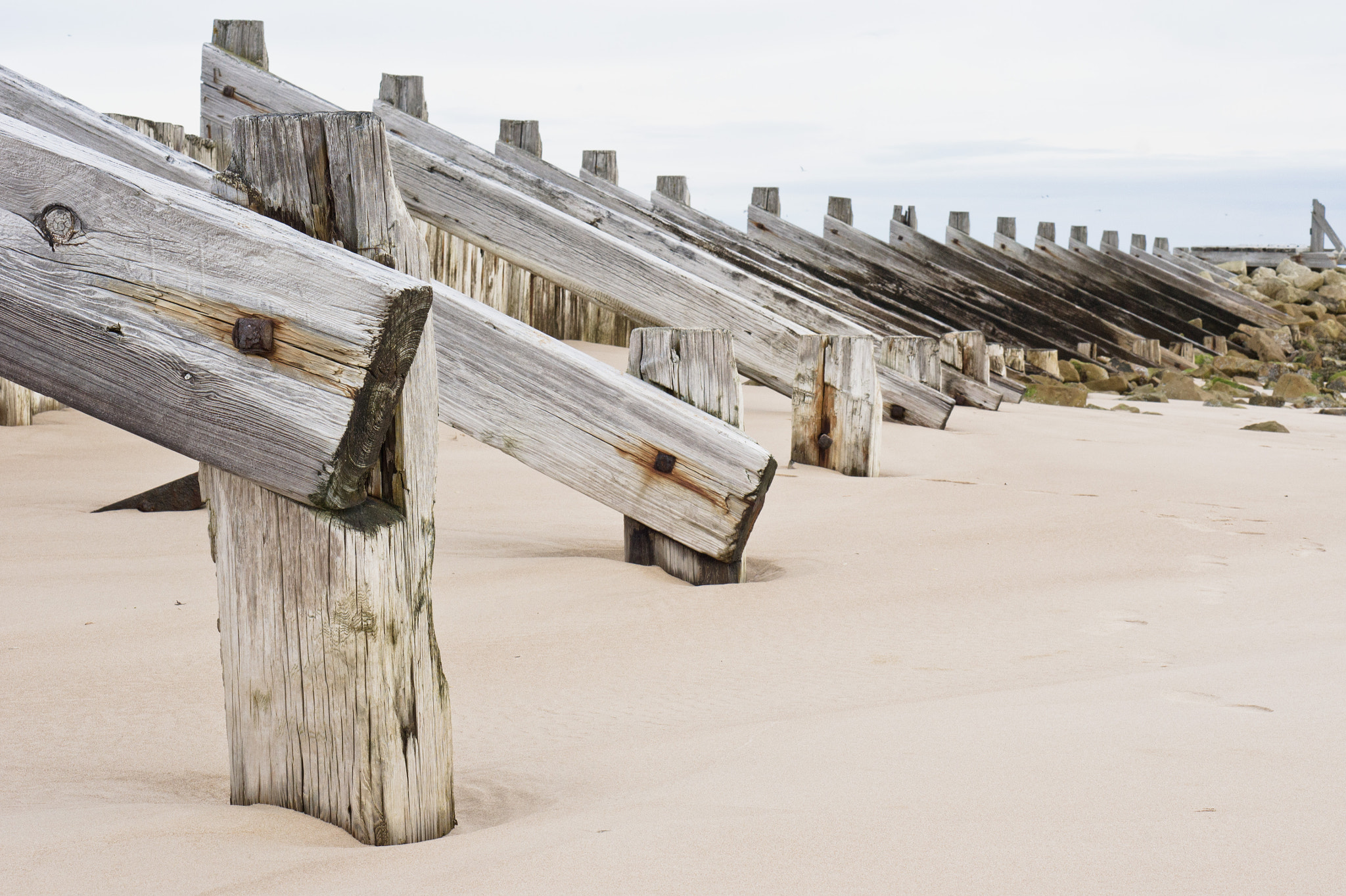 Sony Alpha NEX-5 + E 50mm F1.8 OSS sample photo. Breakwater photography