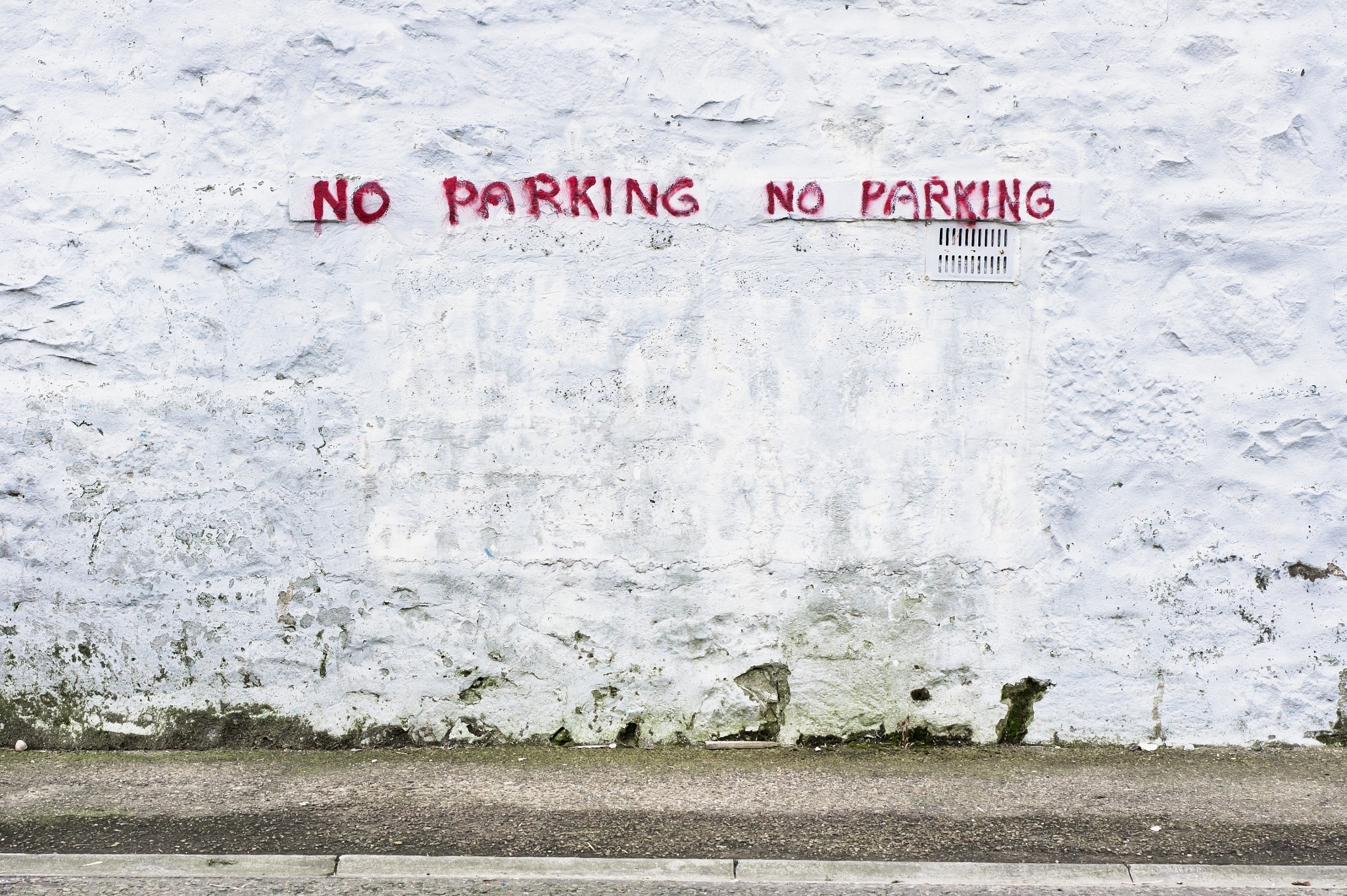Sony Alpha NEX-5 + E 50mm F1.8 OSS sample photo. No parking photography