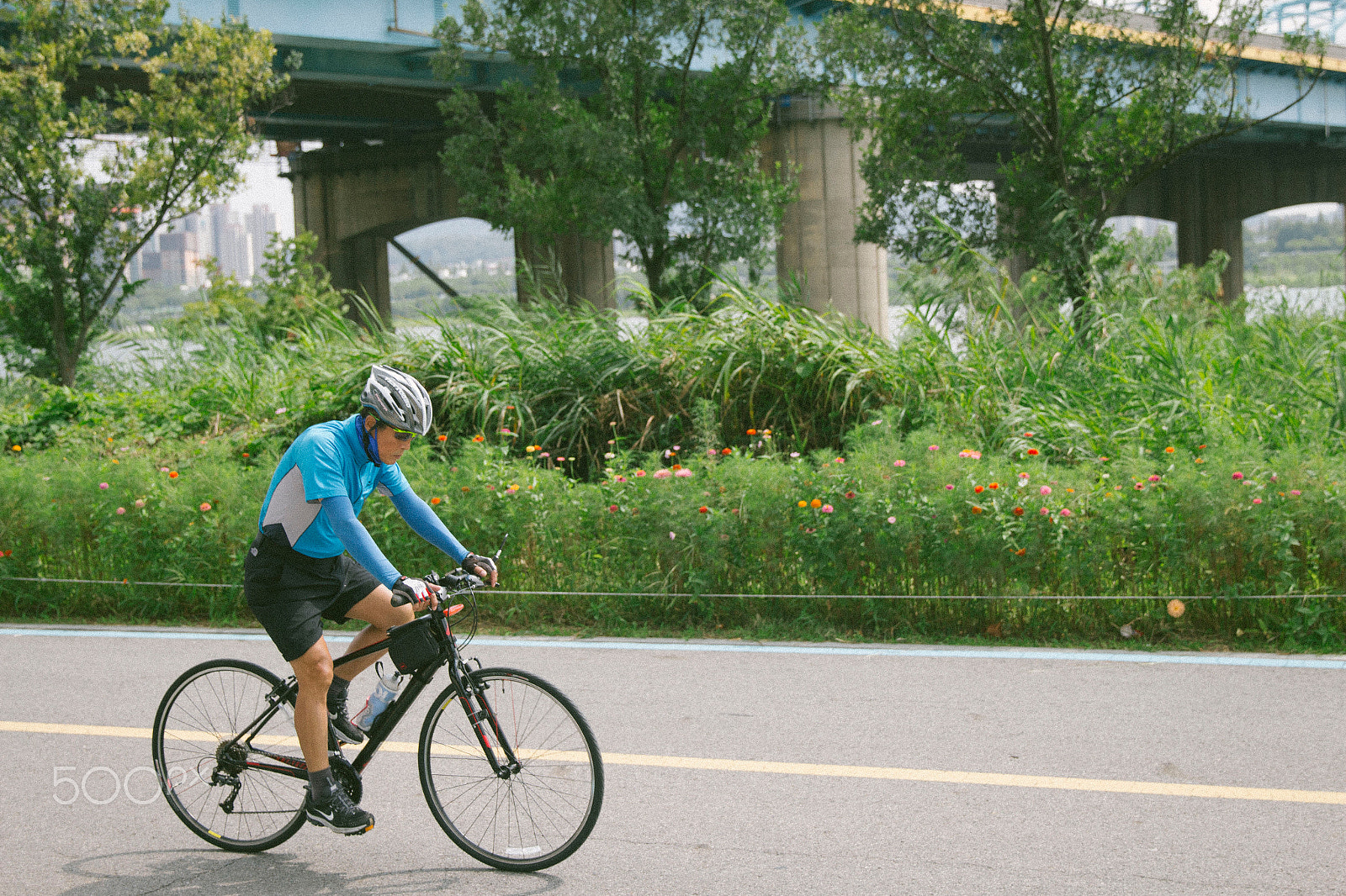 Canon EF 24-70mm F2.8L II USM sample photo. Angled cycling photography