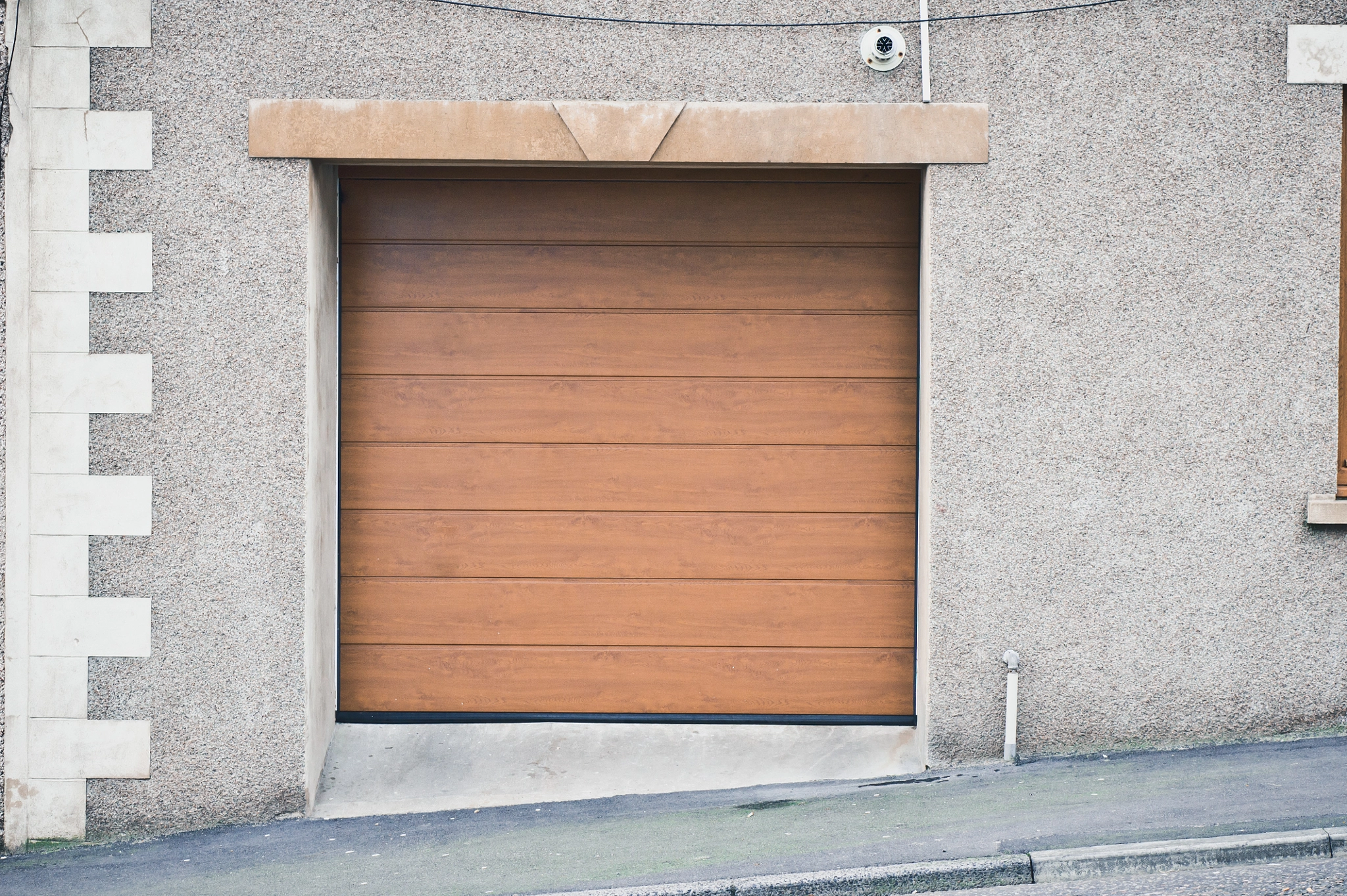 Sony Alpha NEX-5 + E 50mm F1.8 OSS sample photo. Wooden garage door photography