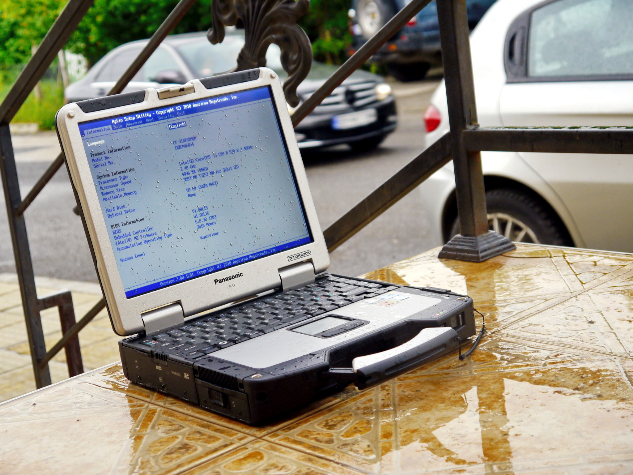 Panasonic Lumix DMC-GH2 + IO 14-42mm F3.5-5.6 sample photo. Notebook in rain photography