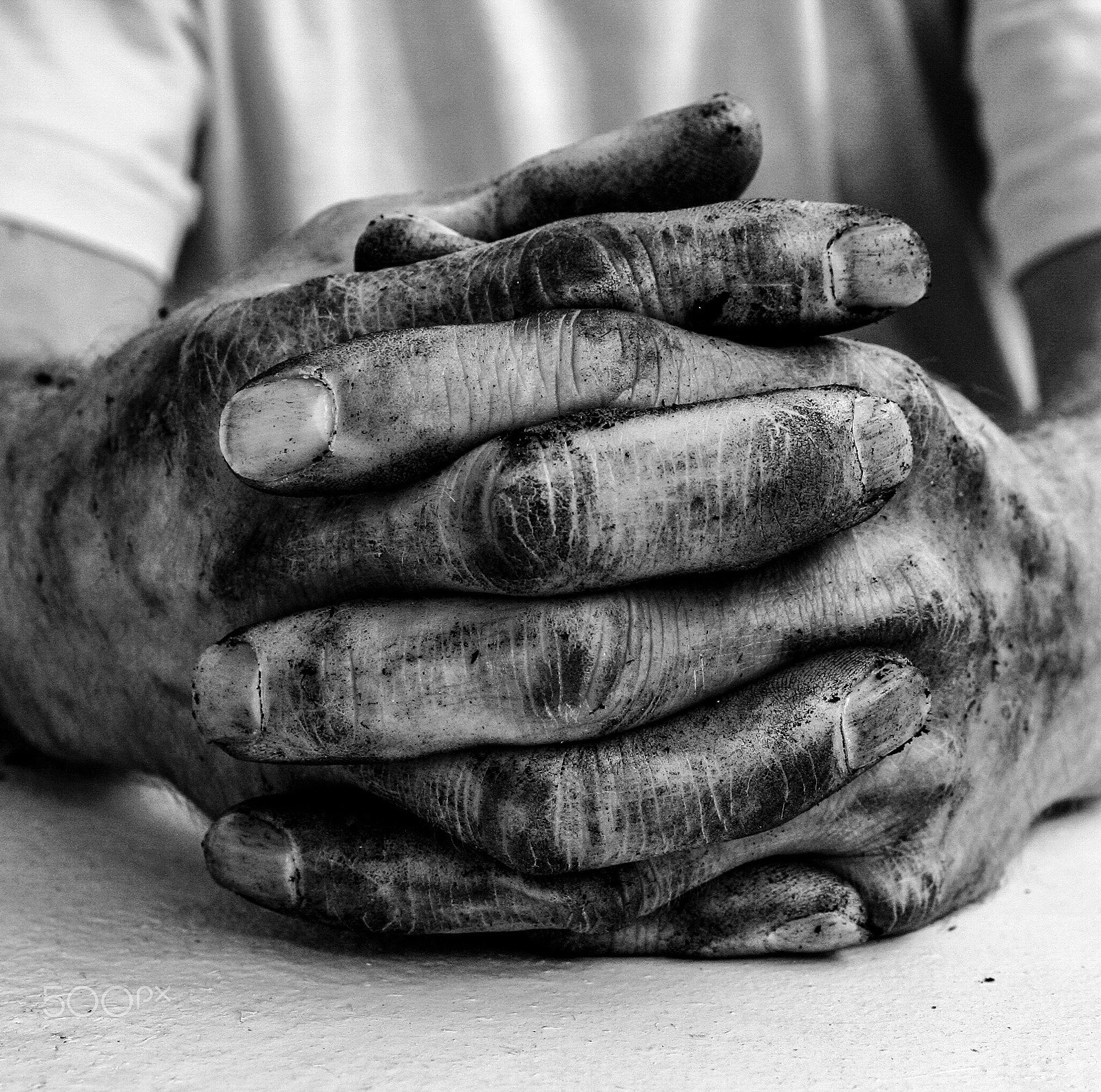Canon EOS 350D (EOS Digital Rebel XT / EOS Kiss Digital N) + Canon EF 50mm f/1.8 sample photo. The worker's hands photography