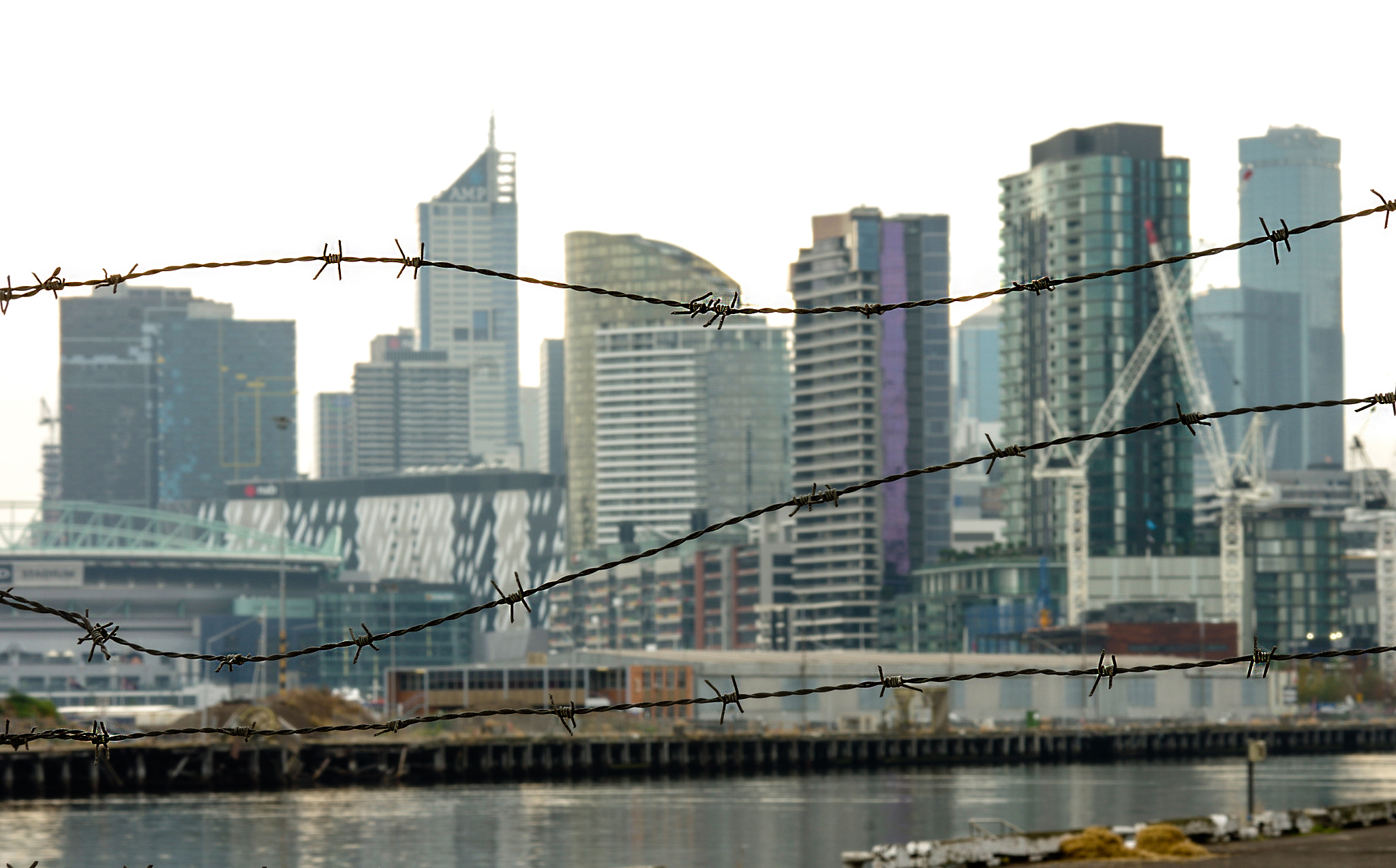 Pentax K-3 + Pentax smc DA 70mm F2.4 AL Limited sample photo. Barbed wire city photography