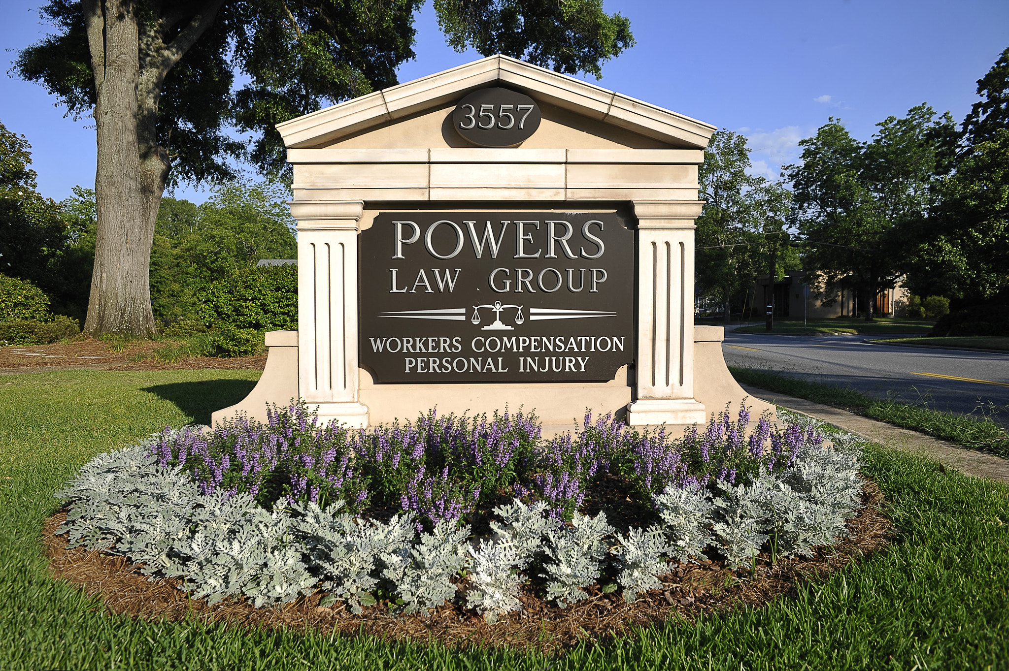 Nikon D700 + AF Nikkor 24mm f/2.8 sample photo. Powers law group sign on vineville avenue photography