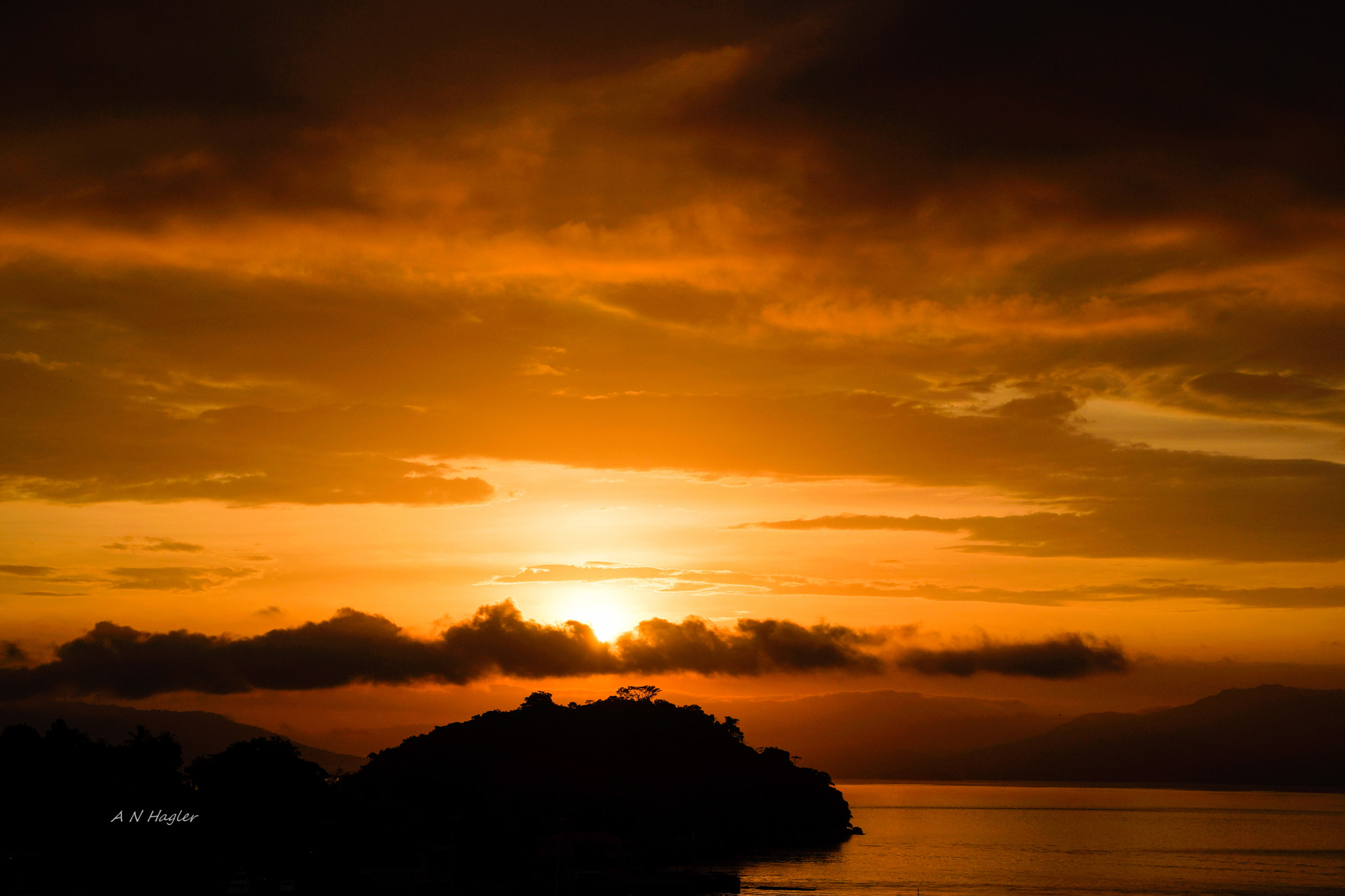 Sony a99 II + 28-75mm F2.8 SAM sample photo. Angra dos reis sunrise above clouds photography