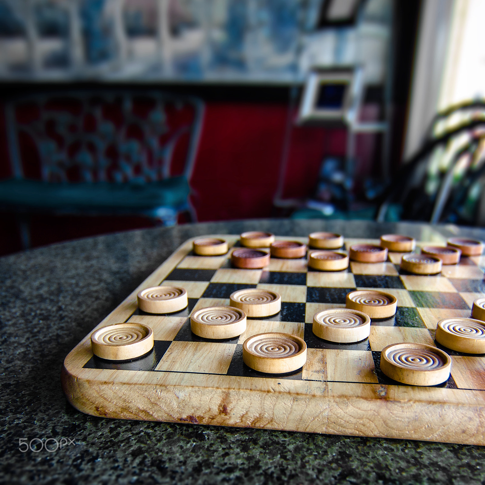 Nikon D5100 + Tokina AT-X 12-28mm F4 Pro DX sample photo. Checkers on table photography