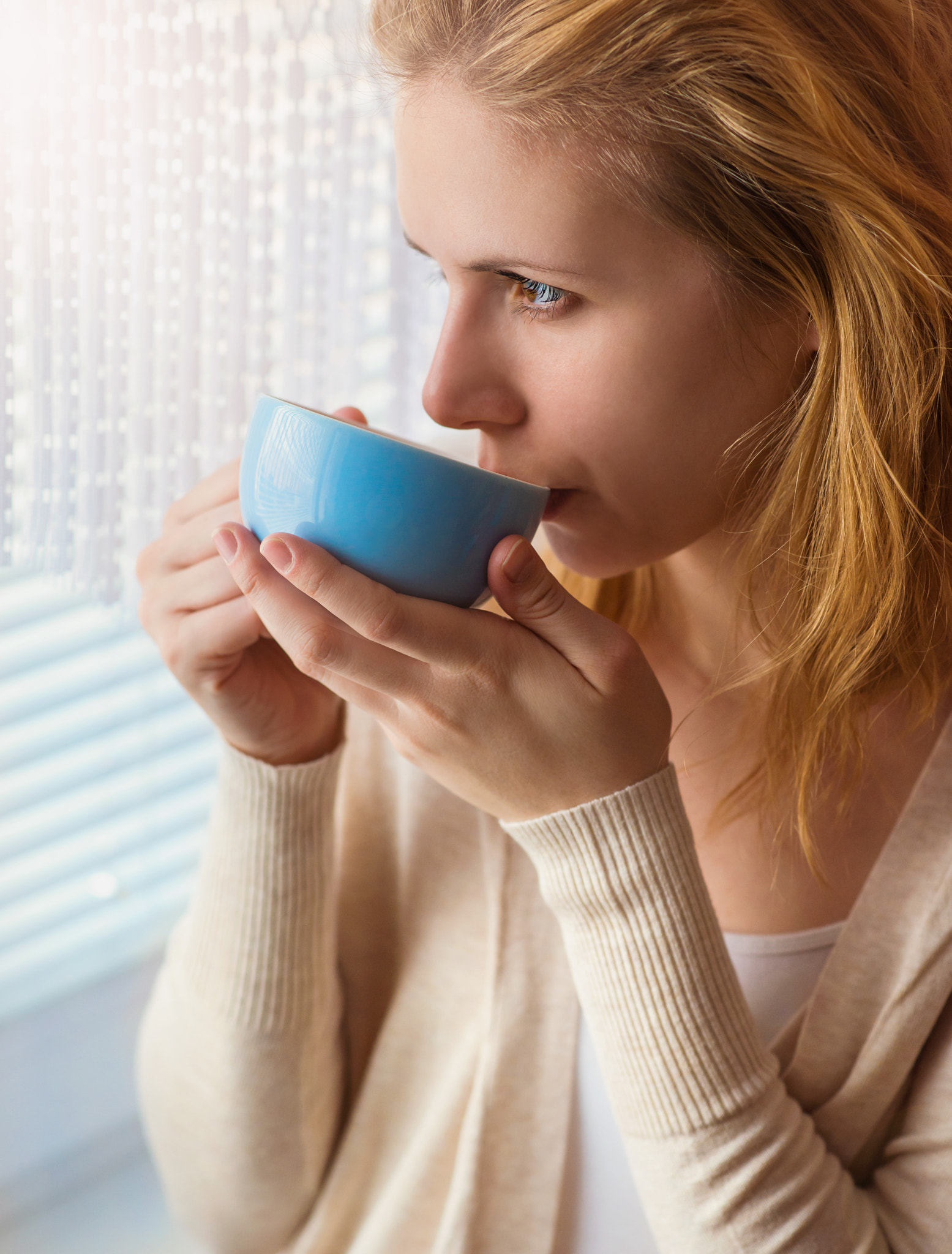 Woman with cup of coffee