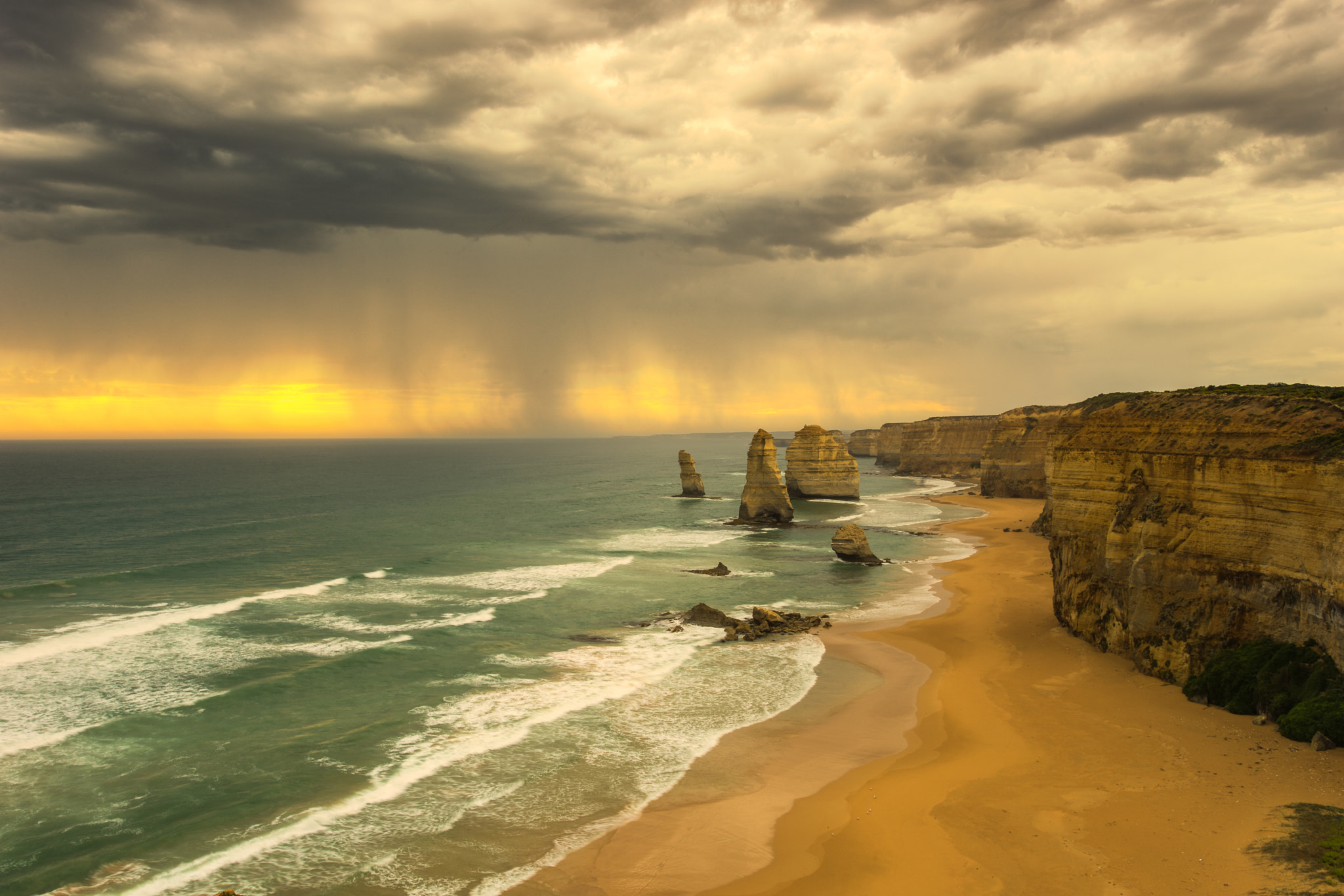 Sony a7 + Canon EF 17-40mm F4L USM sample photo. Storm clouds 12 apostles photography