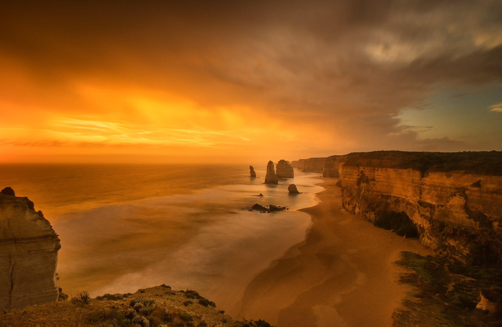 Sony a7 + Canon EF 17-40mm F4L USM sample photo. Storm clouds 12 apostles photography