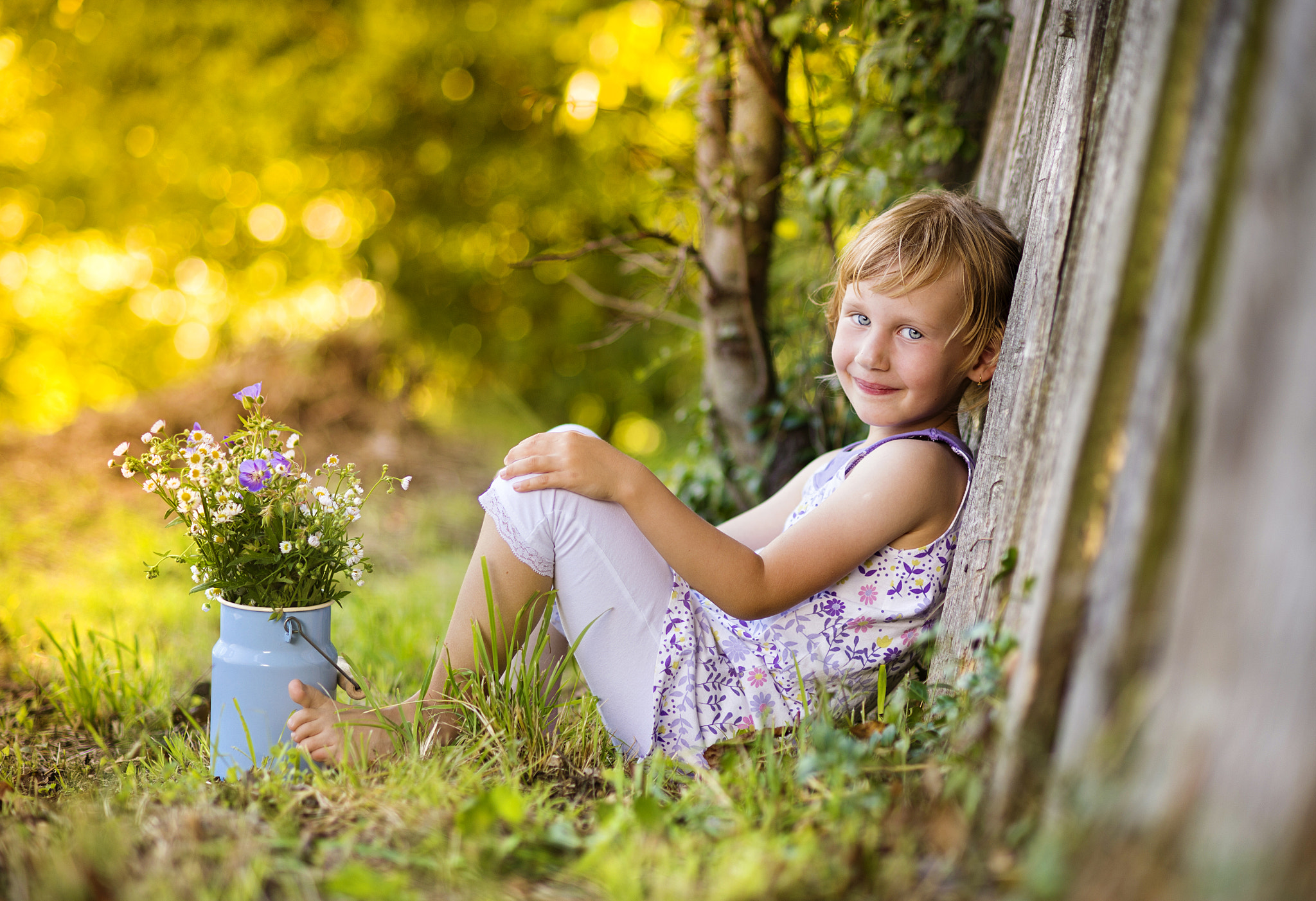 Nikon D4S + Nikon AF Nikkor 85mm F1.8D sample photo. Cute little girl with flowers laughing photography