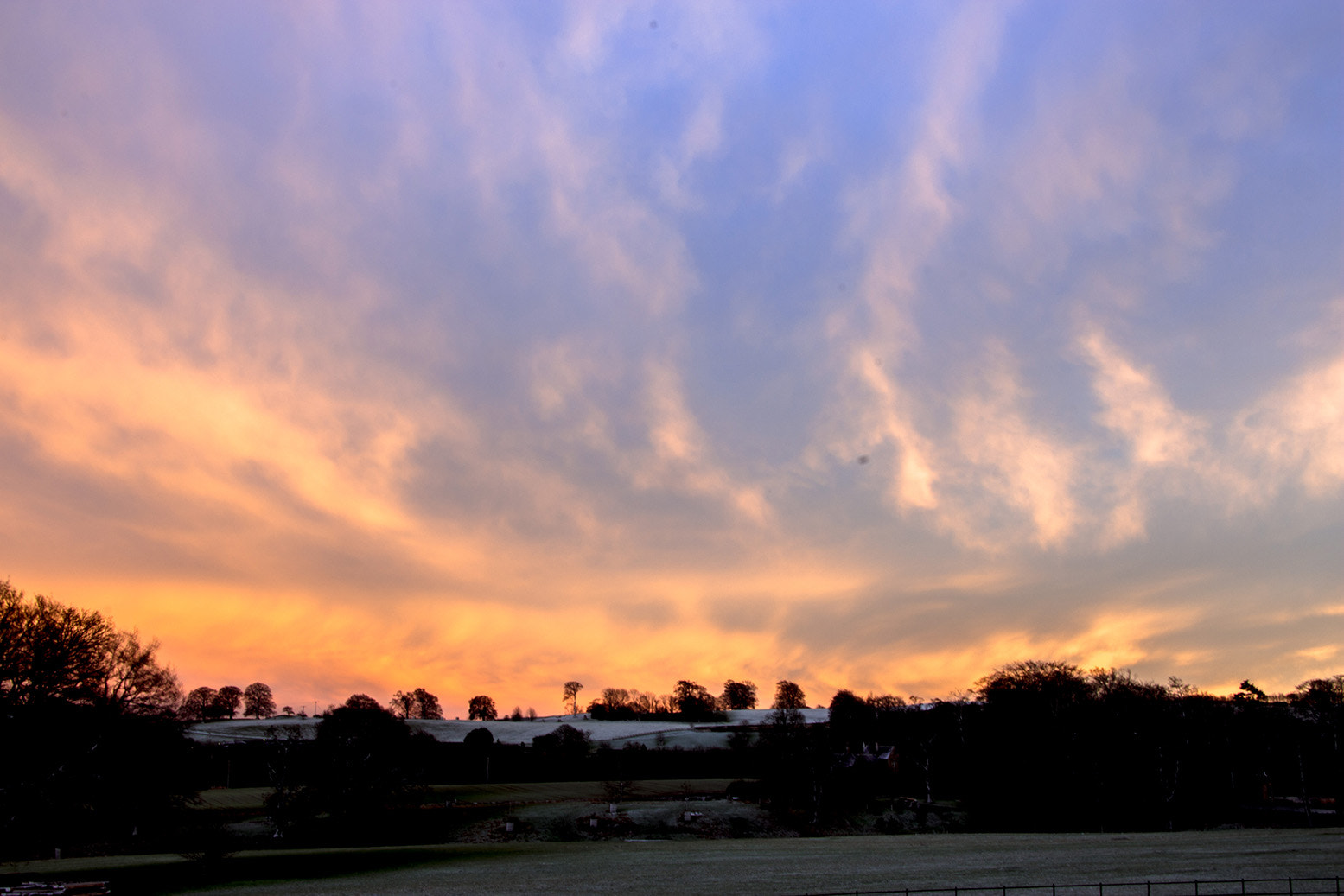 Canon EOS M sample photo. Wispy clouds jan photography
