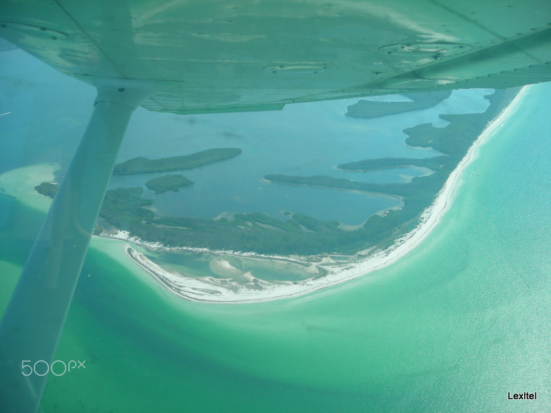 Nikon COOLPIX L6 sample photo. Island flying photography