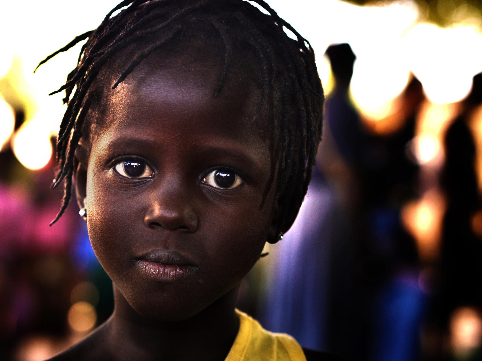 Panasonic Lumix DMC-G1 + Olympus M.Zuiko Digital 45mm F1.8 sample photo. Gambian villager photography