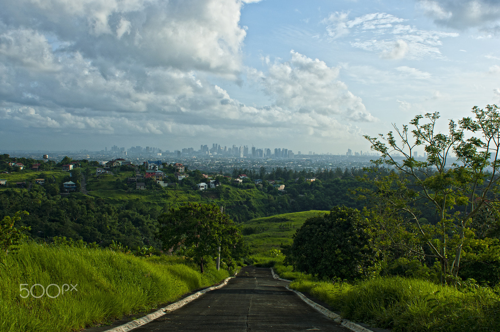 AF Zoom-Nikkor 28-85mm f/3.5-4.5 sample photo. Road to the city photography