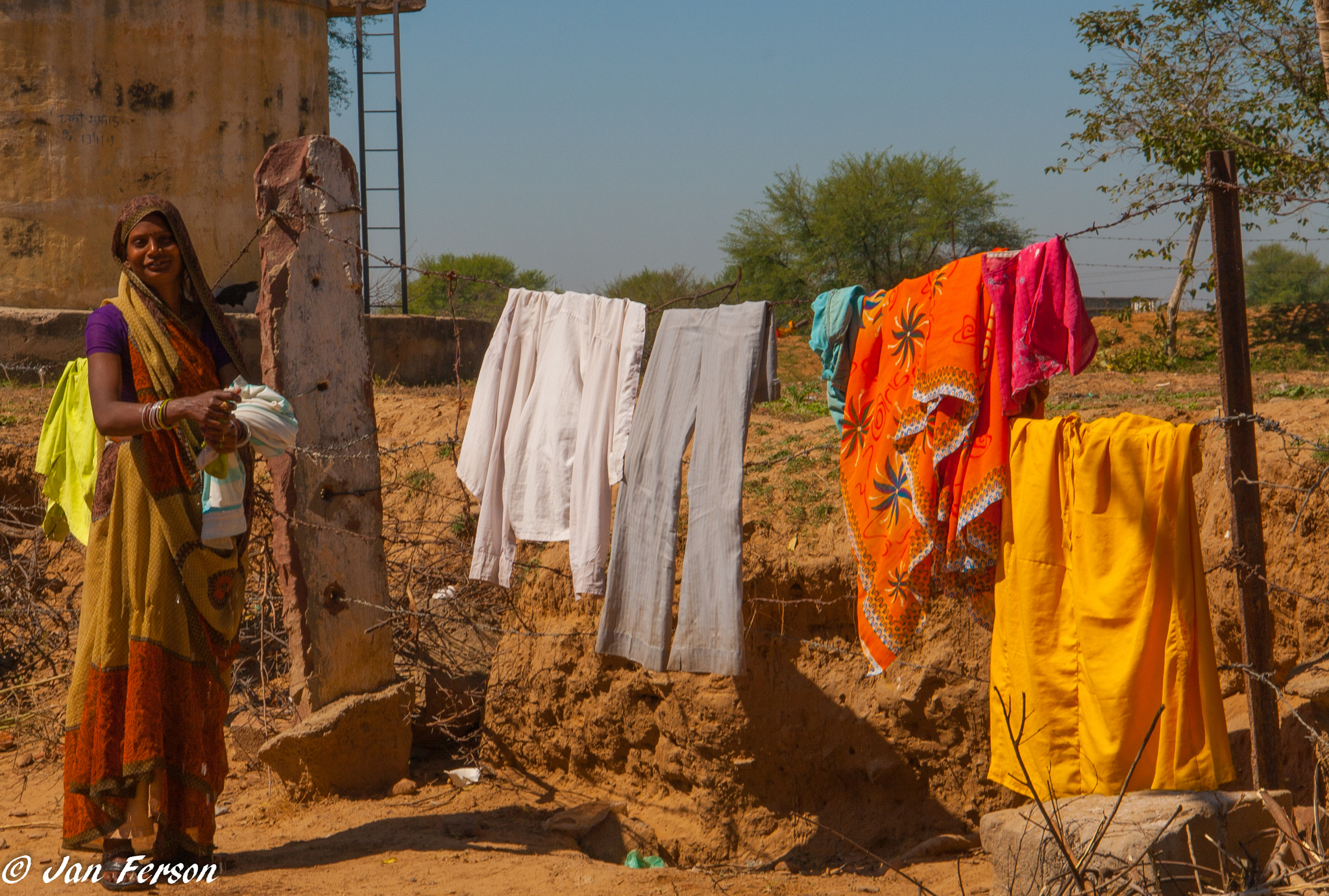 Canon EF-S 18-135mm F3.5-5.6 IS sample photo. Friendly lady in rajasthan photography