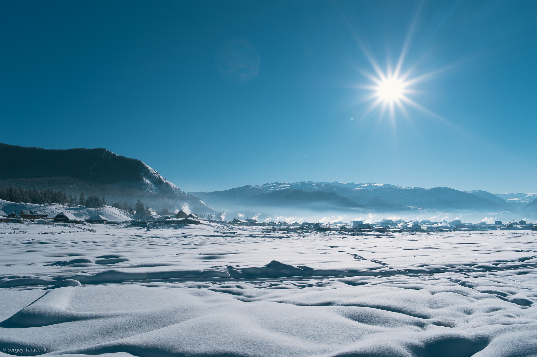 Nikon Df + Nikon AF-S Nikkor 28mm F1.8G sample photo. Winter village on the altai mountains photography