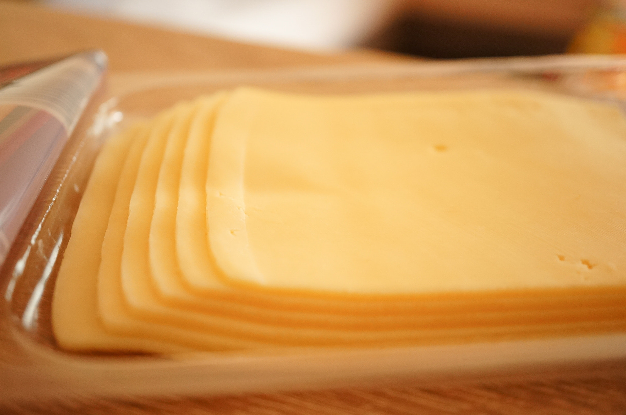 Sony Alpha NEX-5N + Sony E 30mm F3.5 Macro sample photo. Cheese slices photography