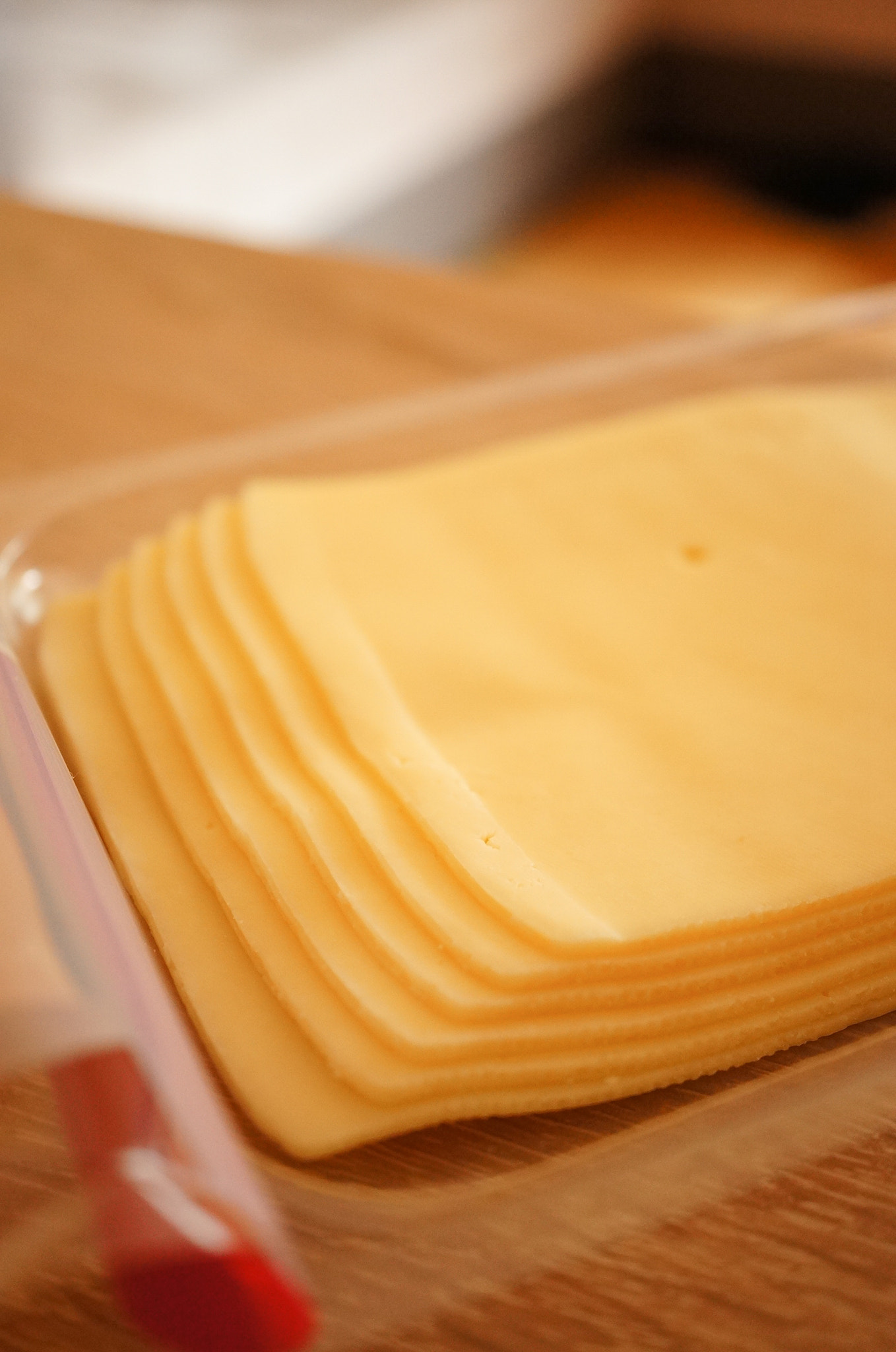 Sony Alpha NEX-5N + Sony E 30mm F3.5 Macro sample photo. Cheese slices photography
