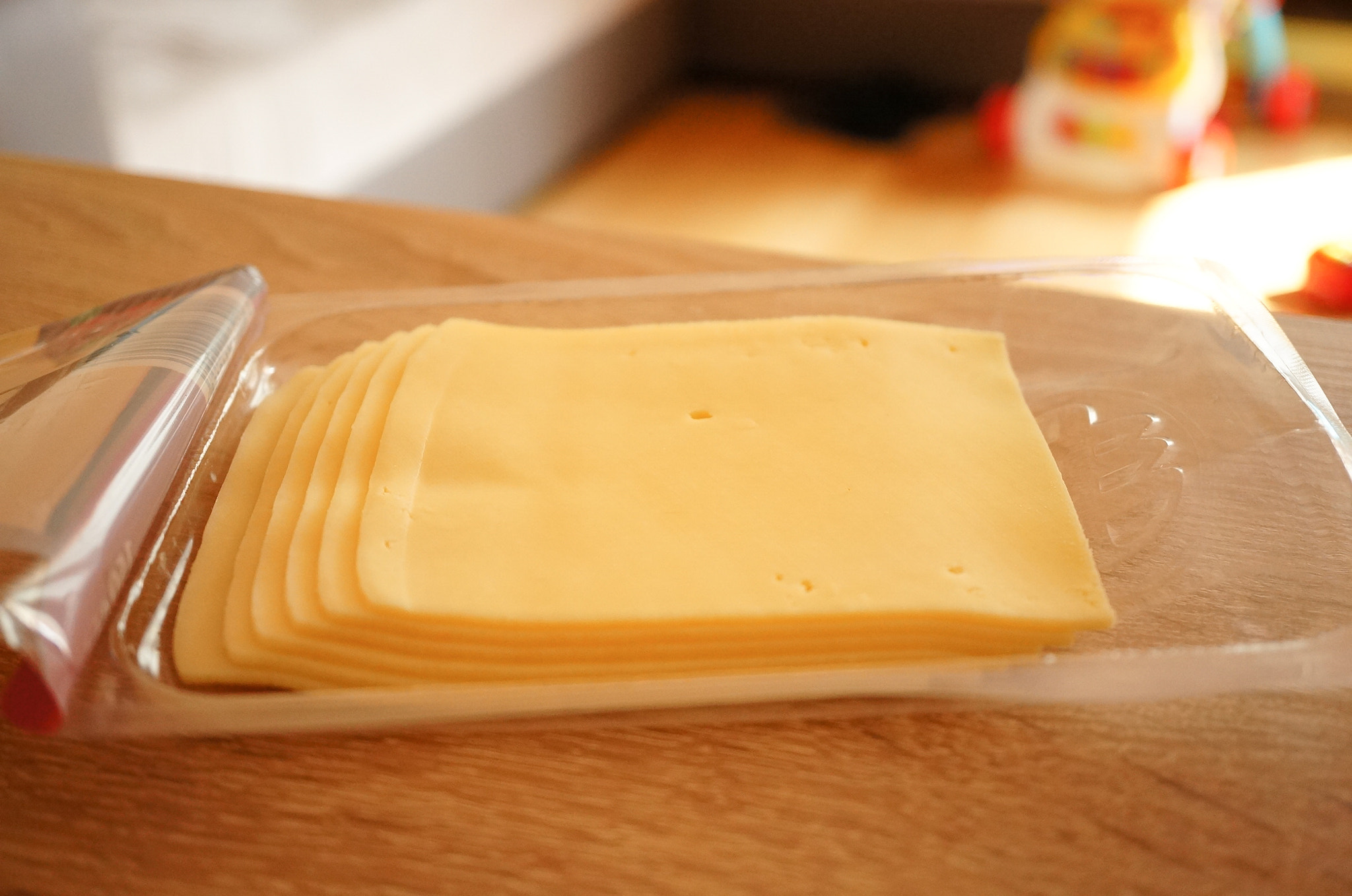 Sony Alpha NEX-5N + Sony E 30mm F3.5 Macro sample photo. Cheese slices photography