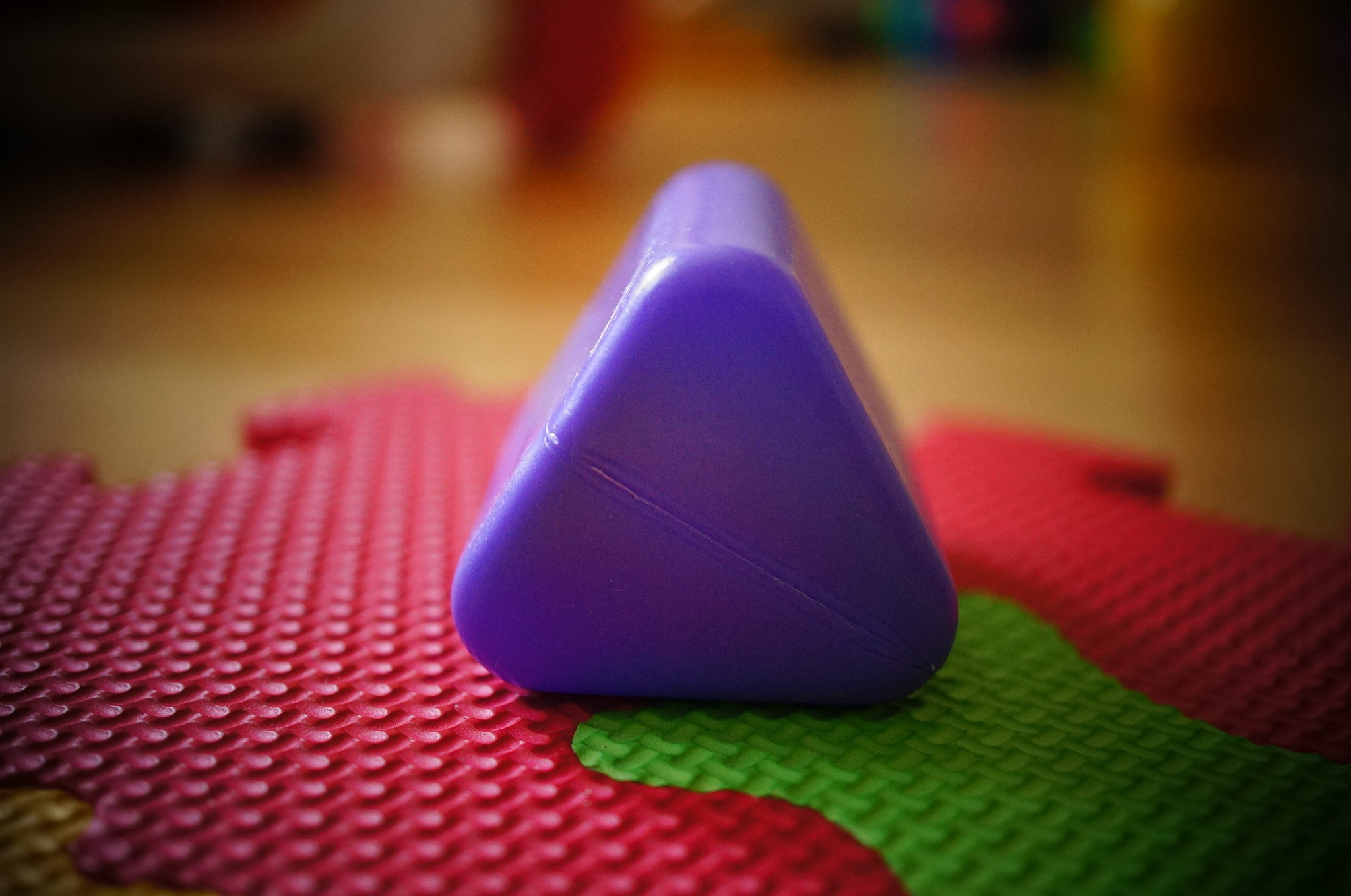 Sony Alpha NEX-5N + Sony E 30mm F3.5 Macro sample photo. Purple triangle block photography