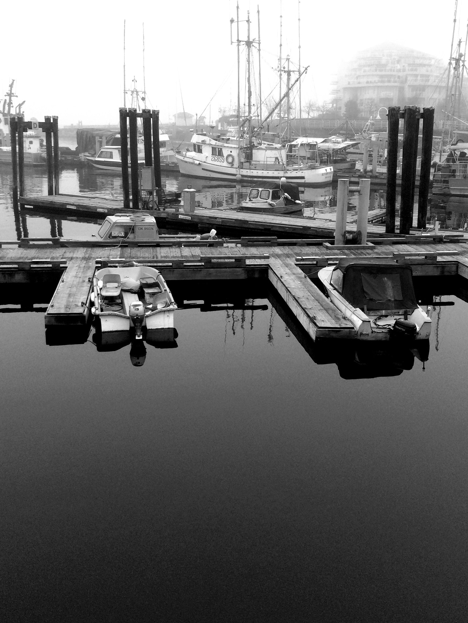 Apple iPhone6,1 sample photo. Little skiffs at rest, b&w, nanaimo harbour, vancouver island, bc, canada. photography