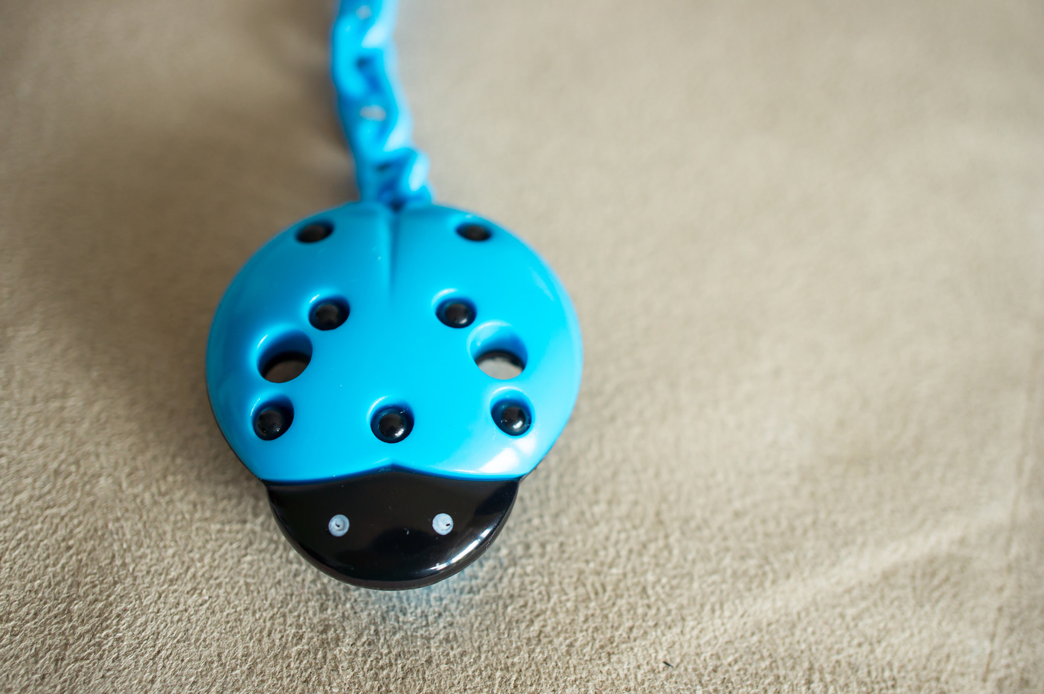 Sony Alpha NEX-5N + Sony E 30mm F3.5 Macro sample photo. Baby pacifier hanger photography